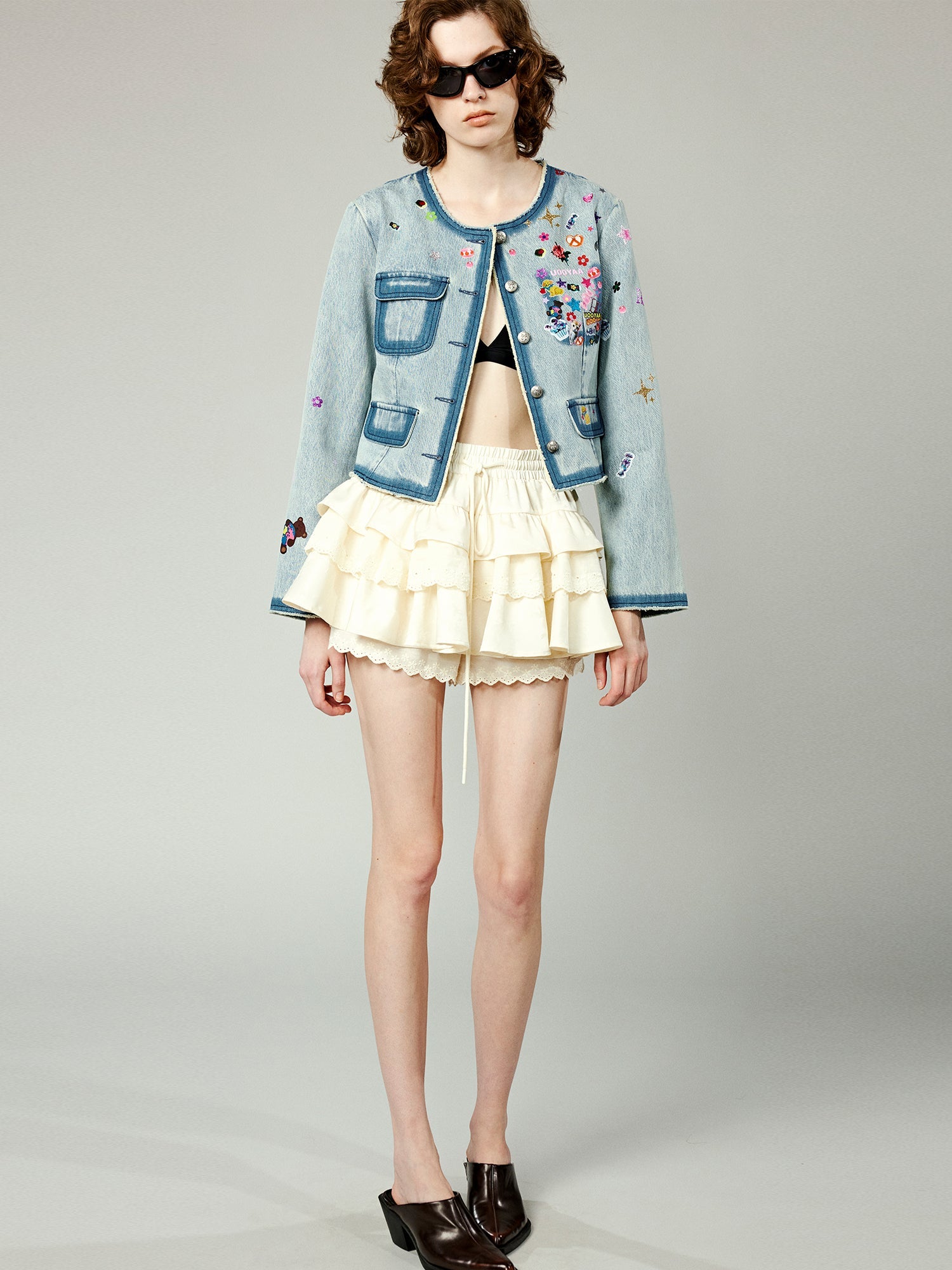 Playful sticker chanel style denim jacket