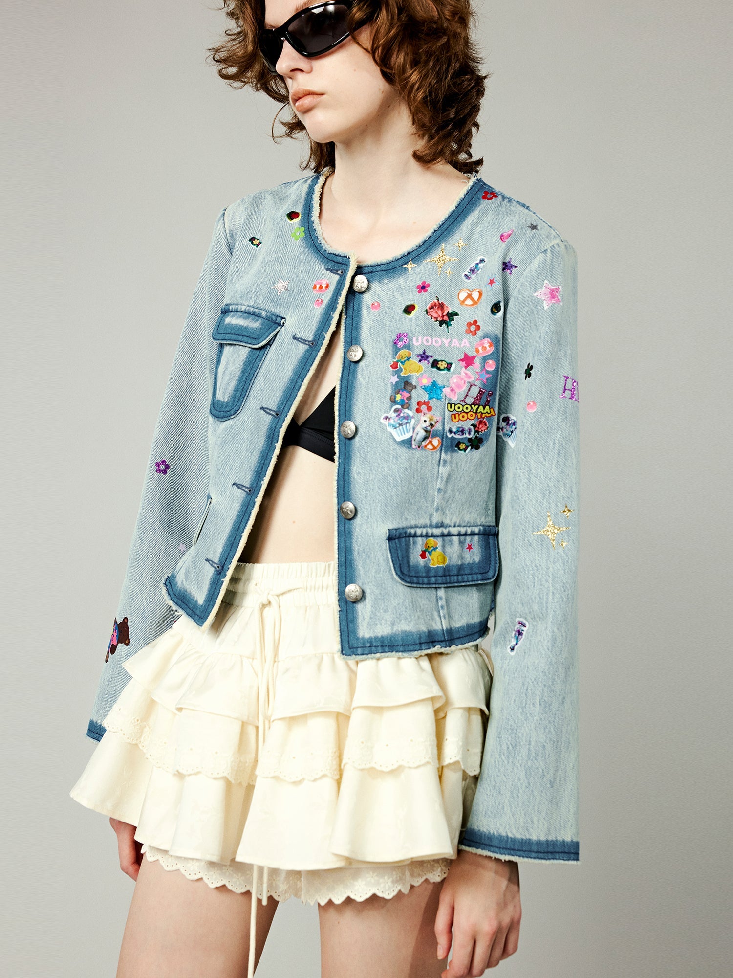 Playful sticker chanel style denim jacket