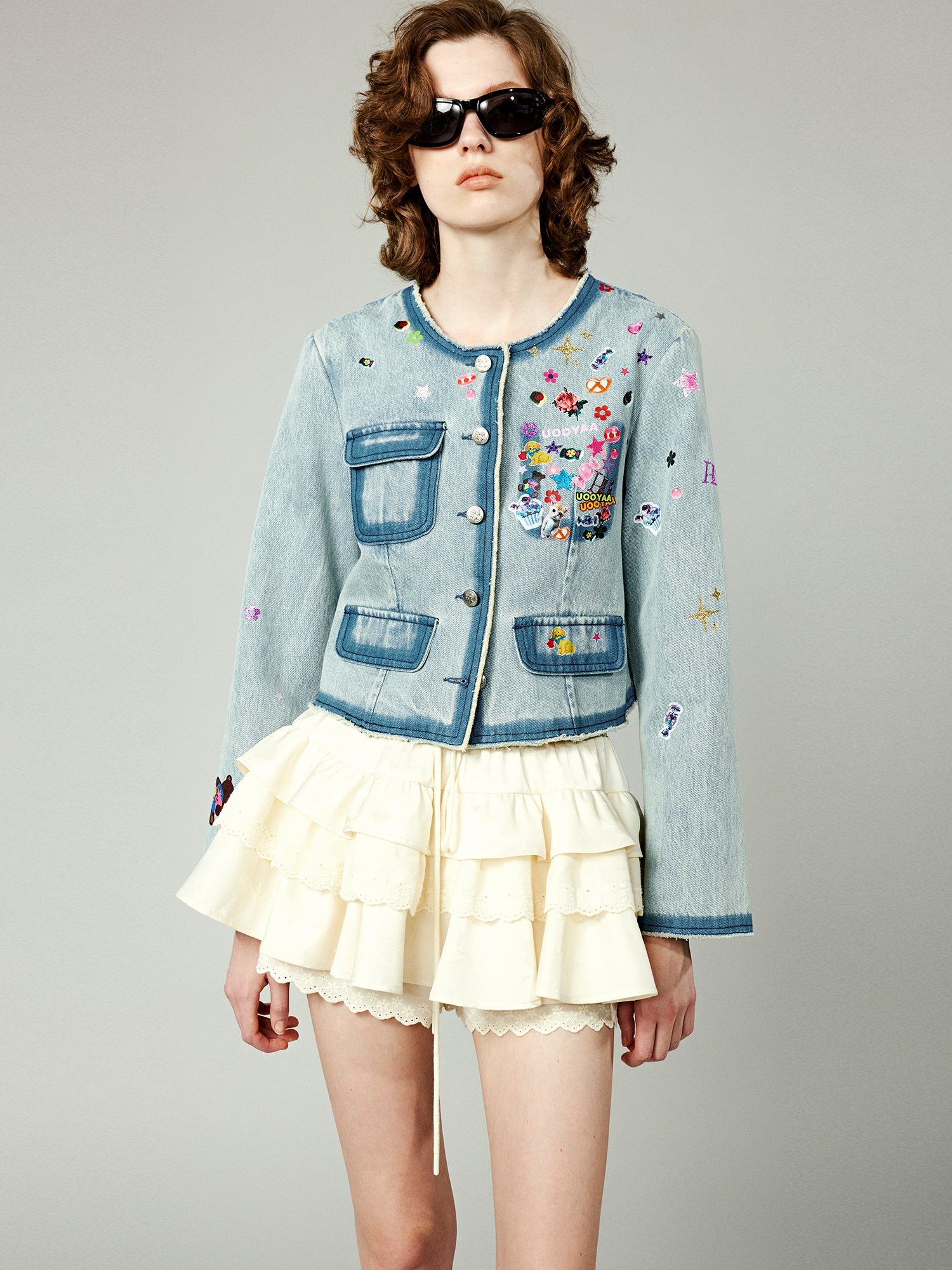 Playful sticker chanel style denim jacket