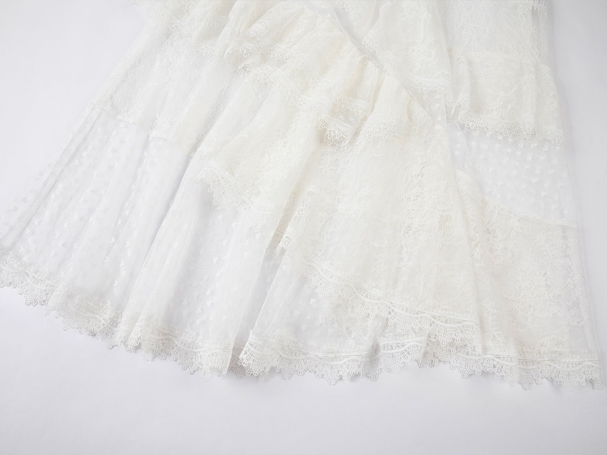 Asymmetrical lace patchwork dress