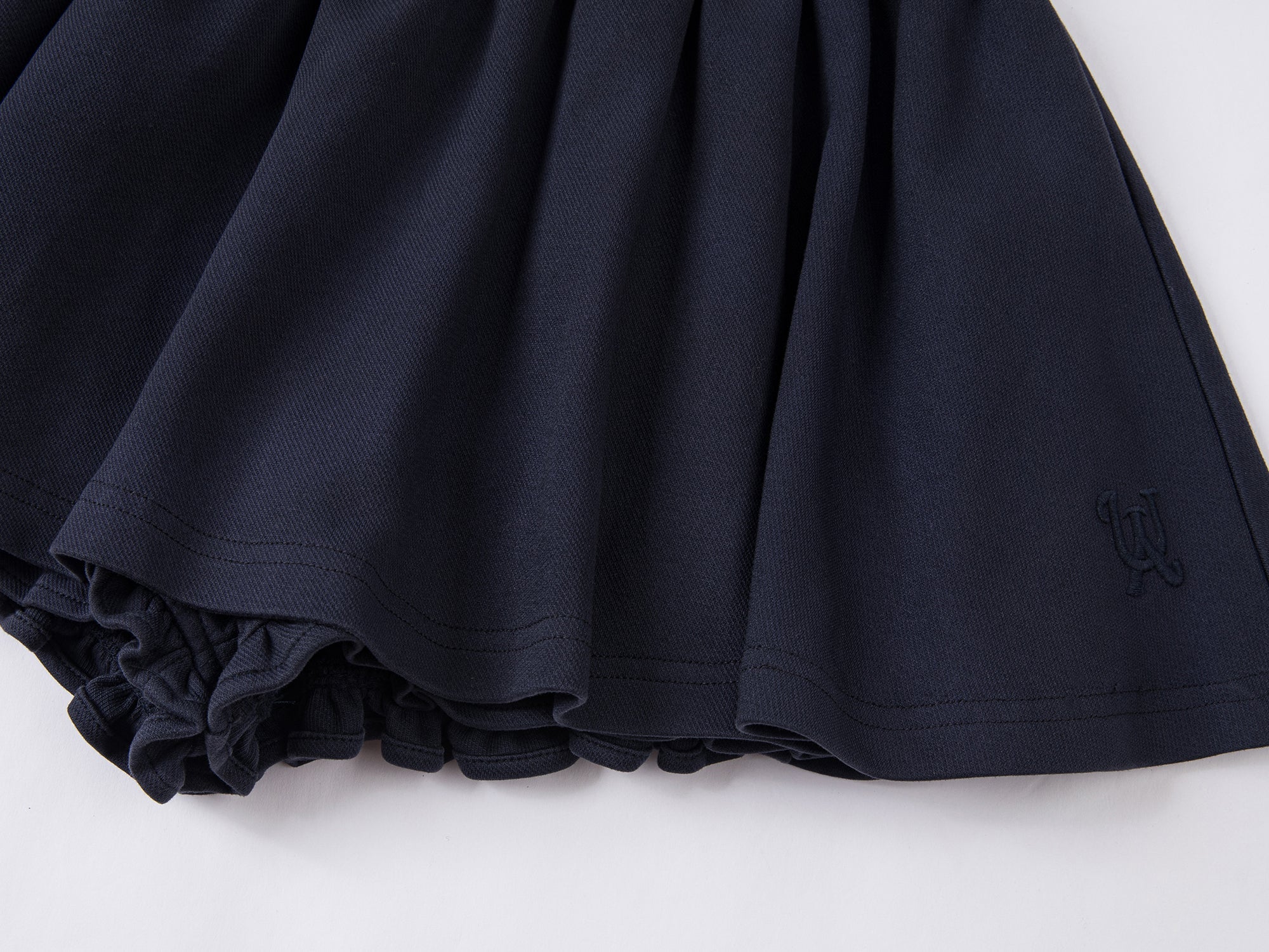 Sporty ruffle hem tweed skort in navy blue