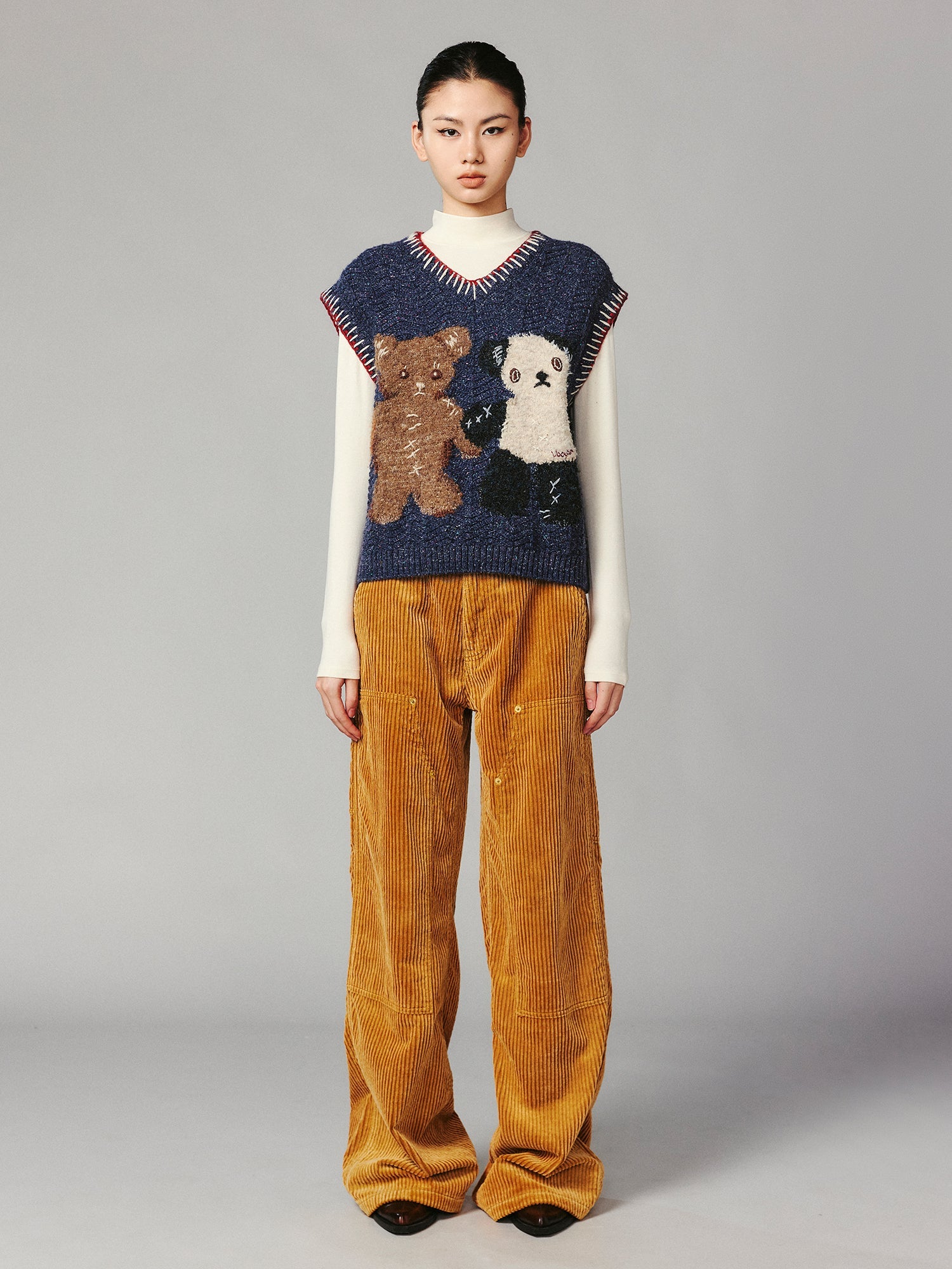 ''Panda and Bear" knitted v-neck sweater vest