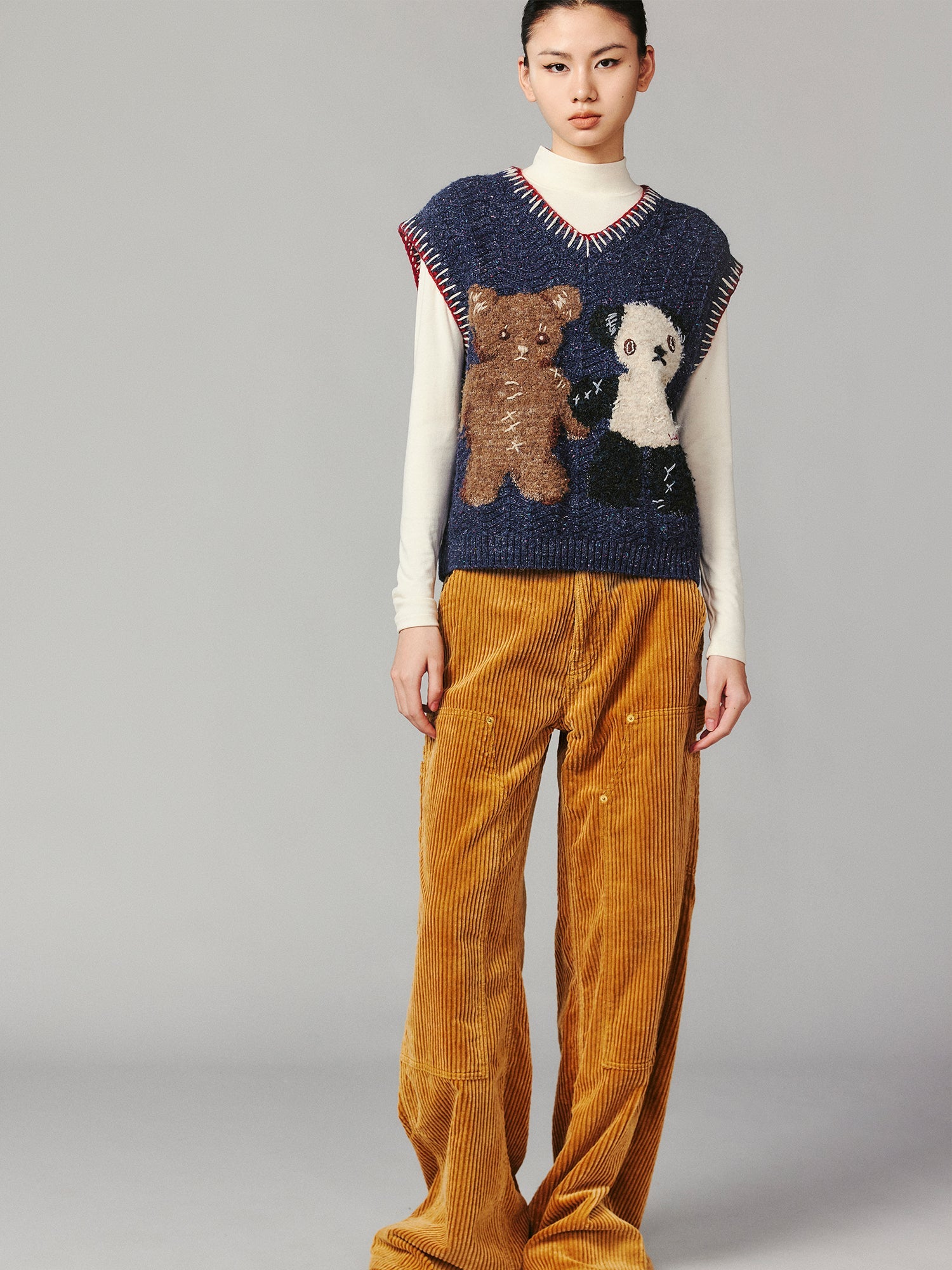 ''Panda and Bear" knitted v-neck sweater vest
