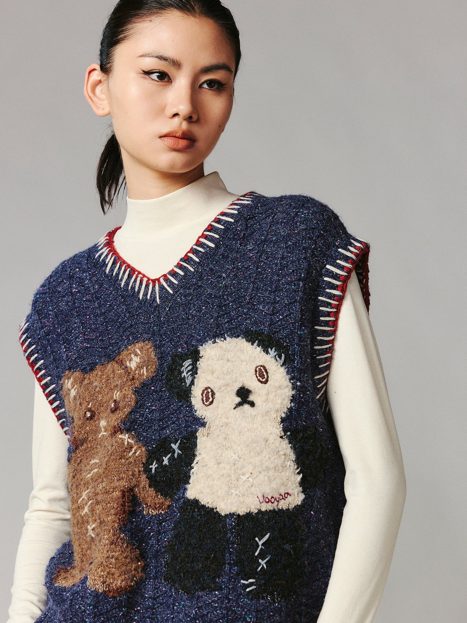 ''Panda and Bear" knitted v-neck sweater vest