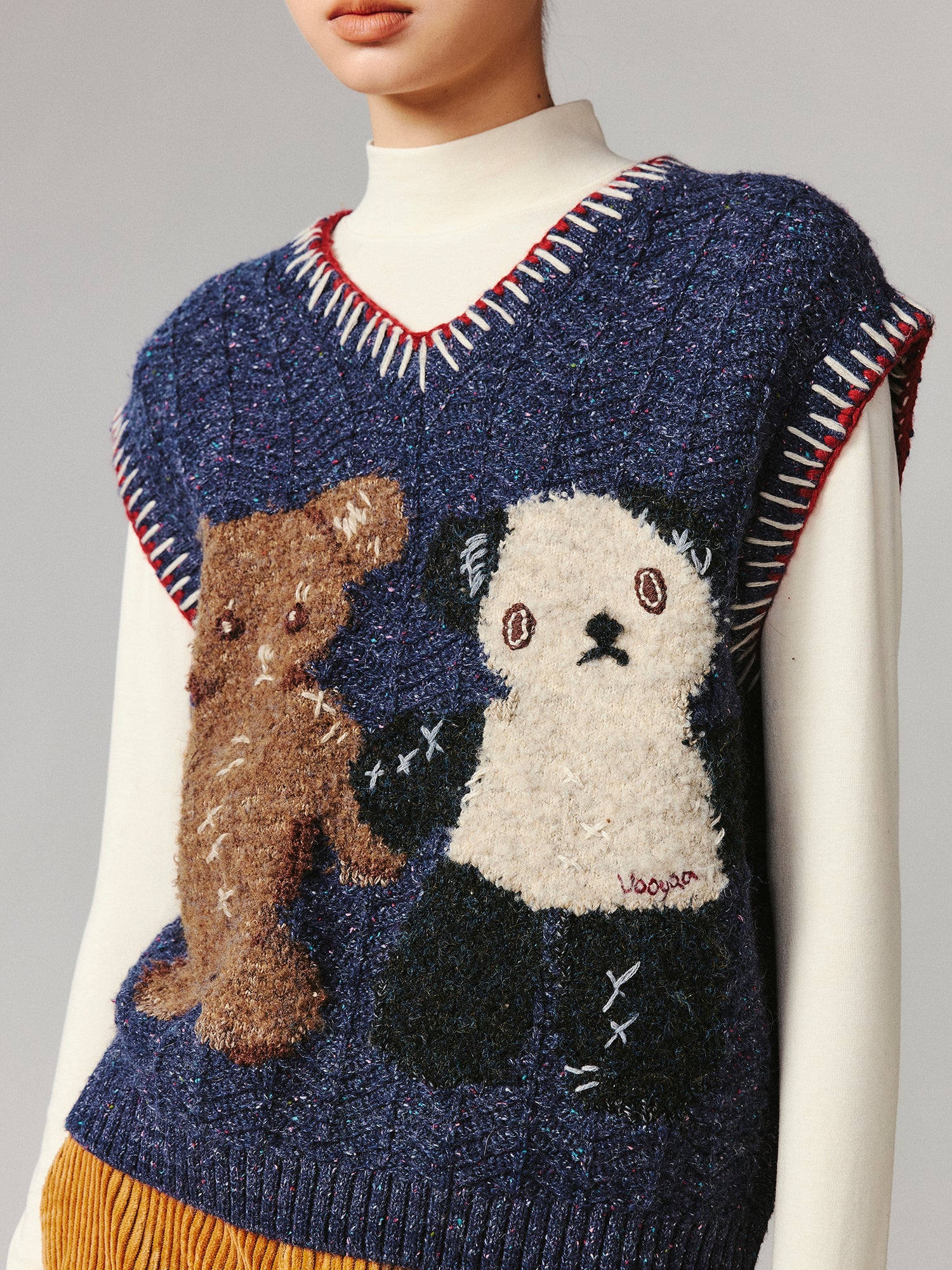 ''Panda and Bear" knitted v-neck sweater vest