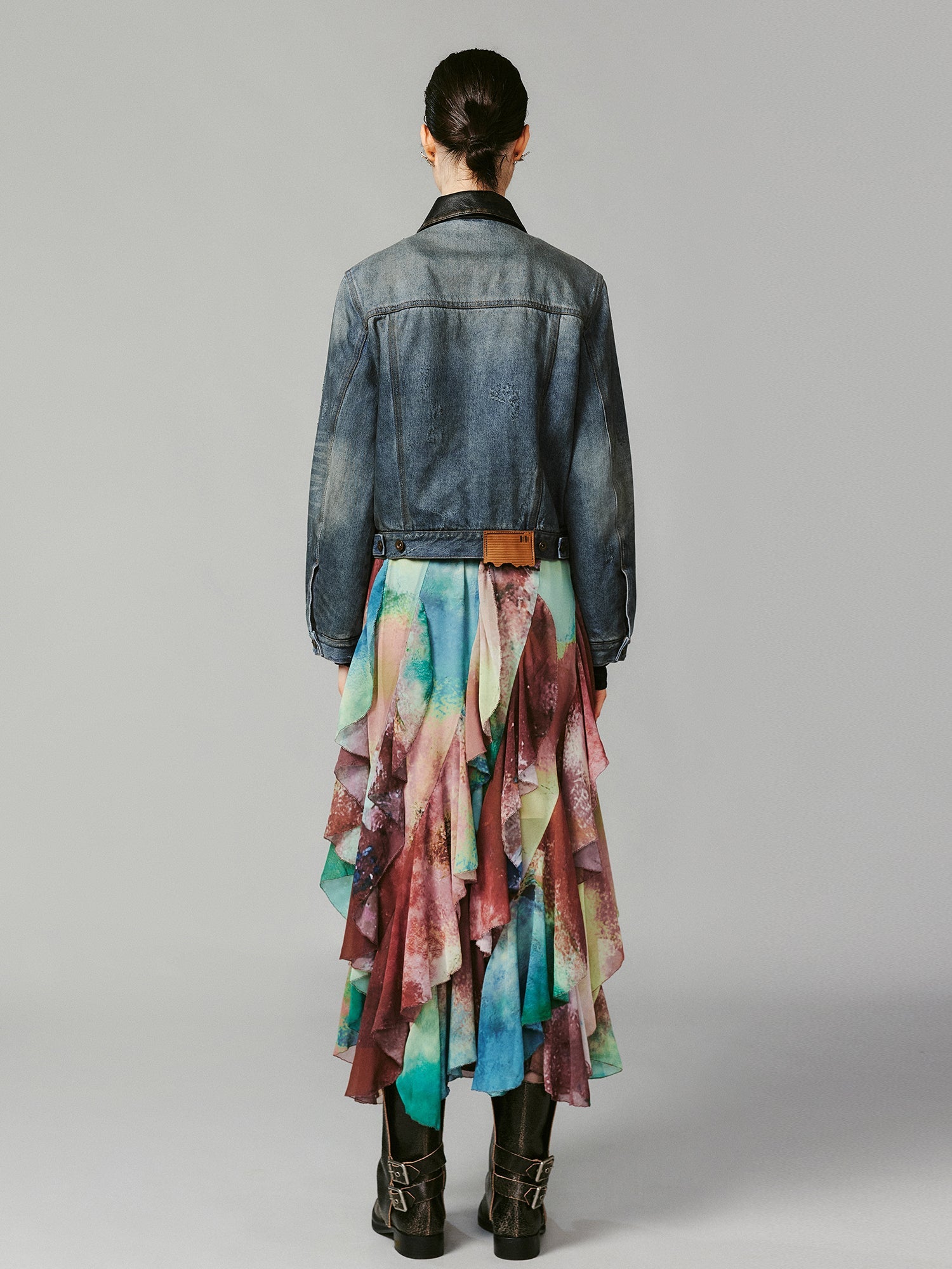 Washed and distressed quilted denim jacket