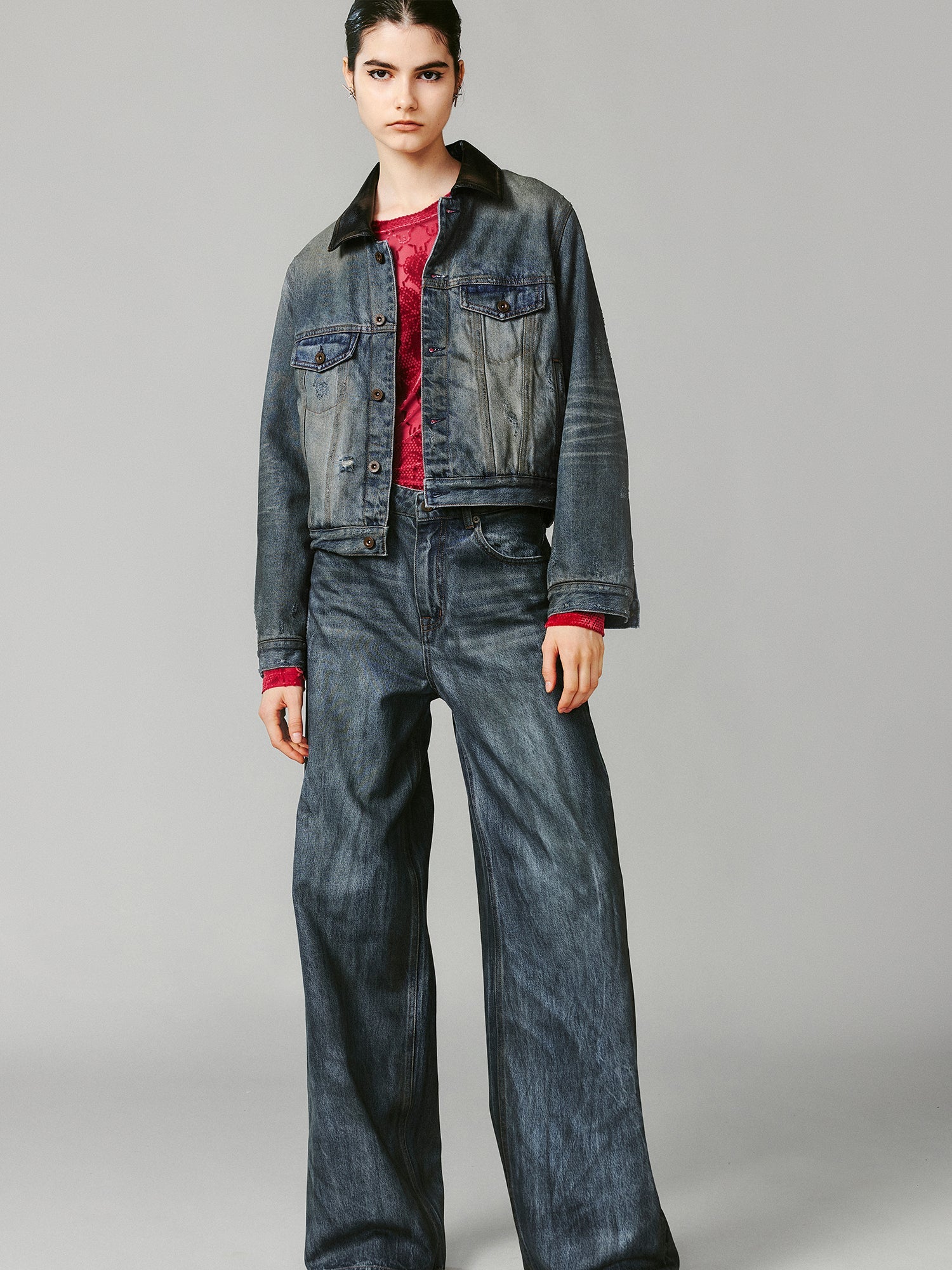 Washed and distressed quilted denim jacket