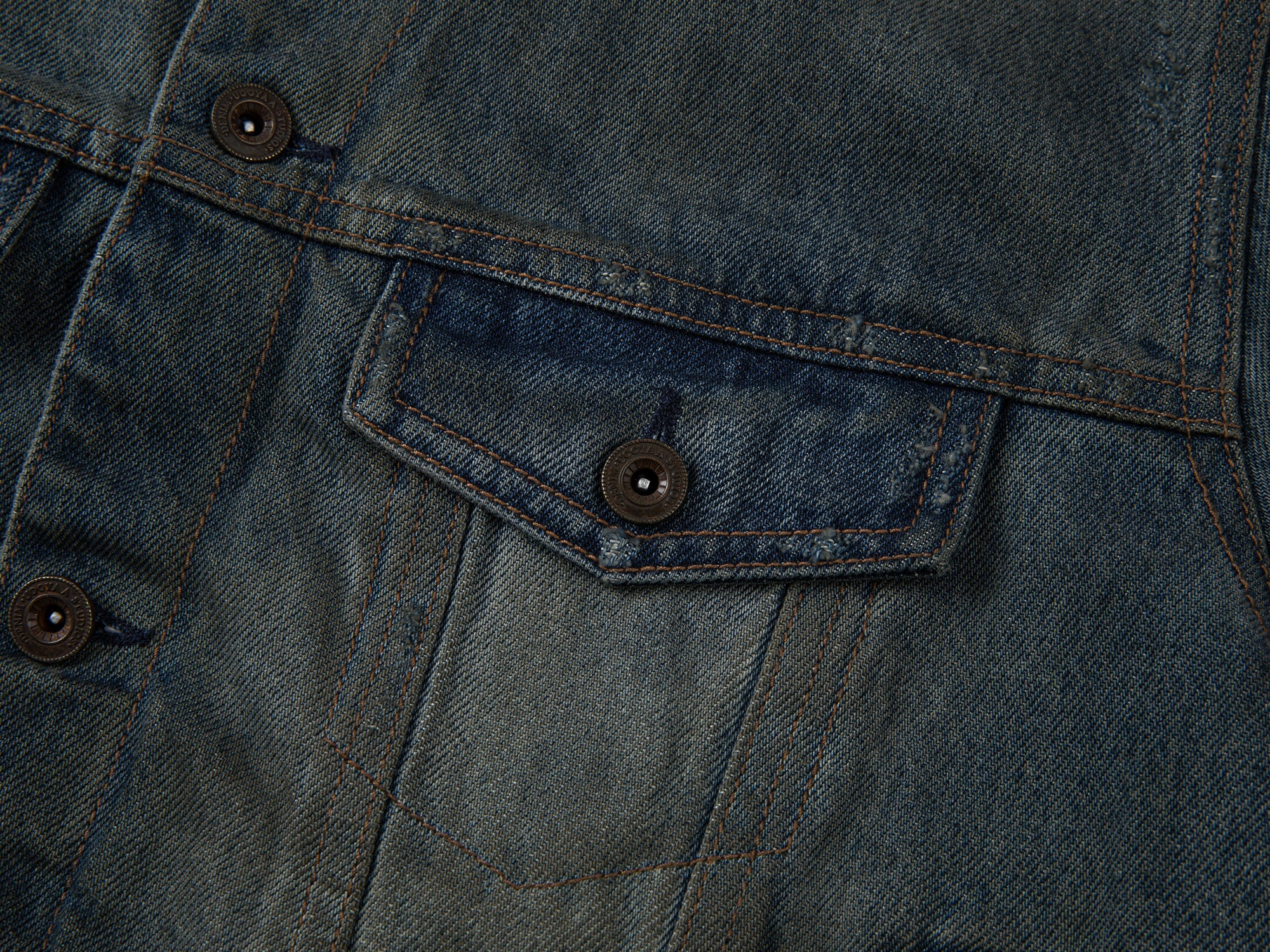 Washed and distressed quilted denim jacket