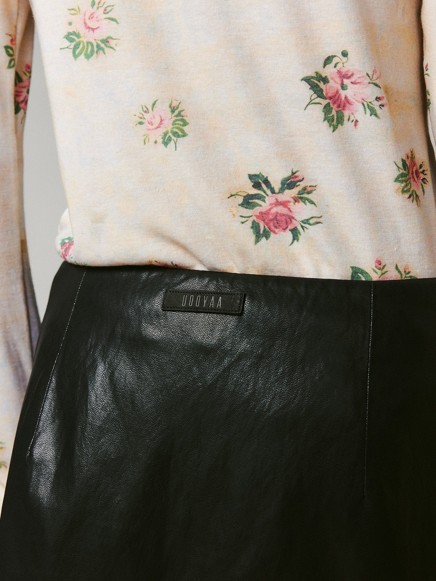 Lace-paneled PU leather skirt