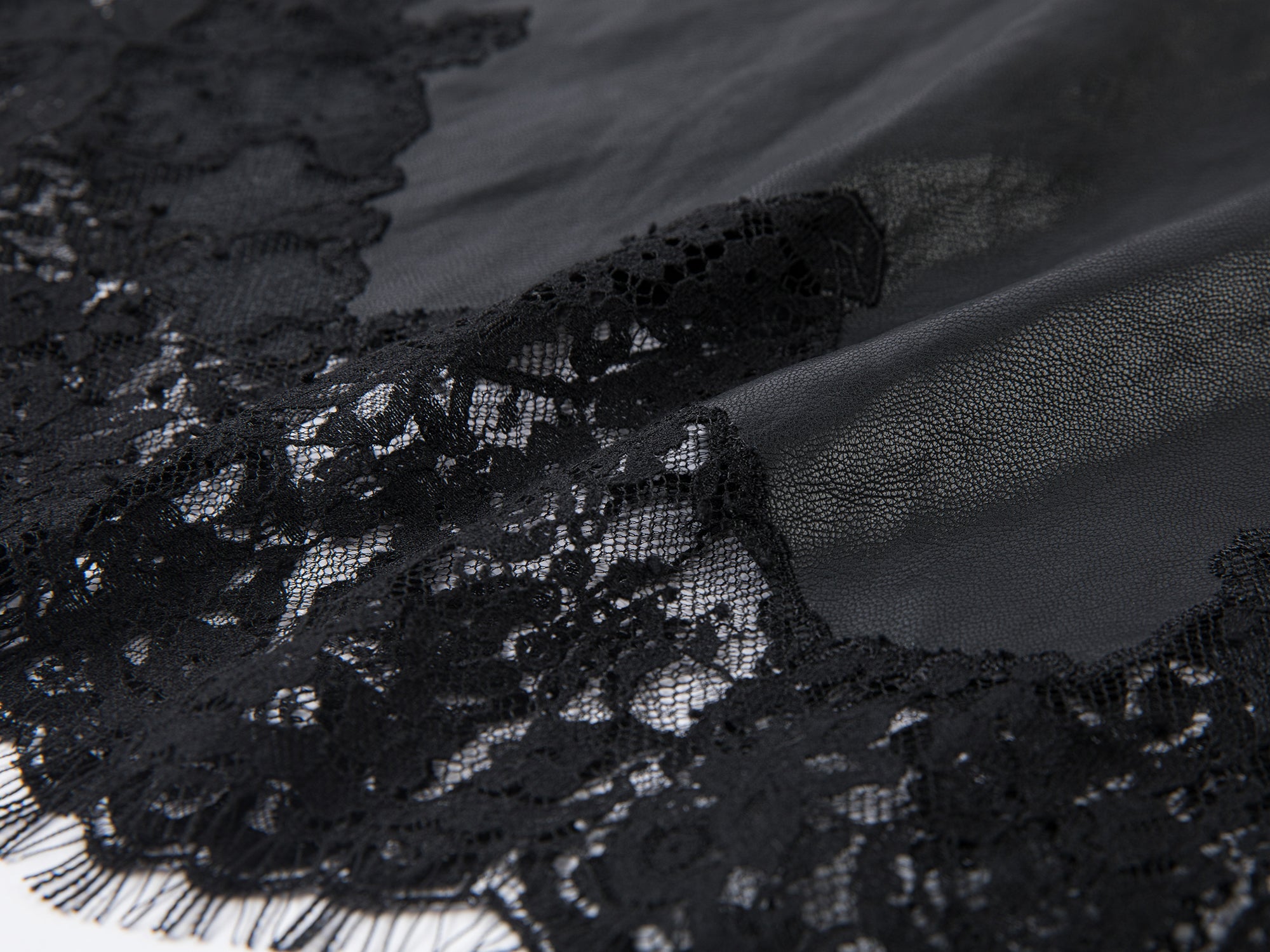 Lace-paneled PU leather skirt