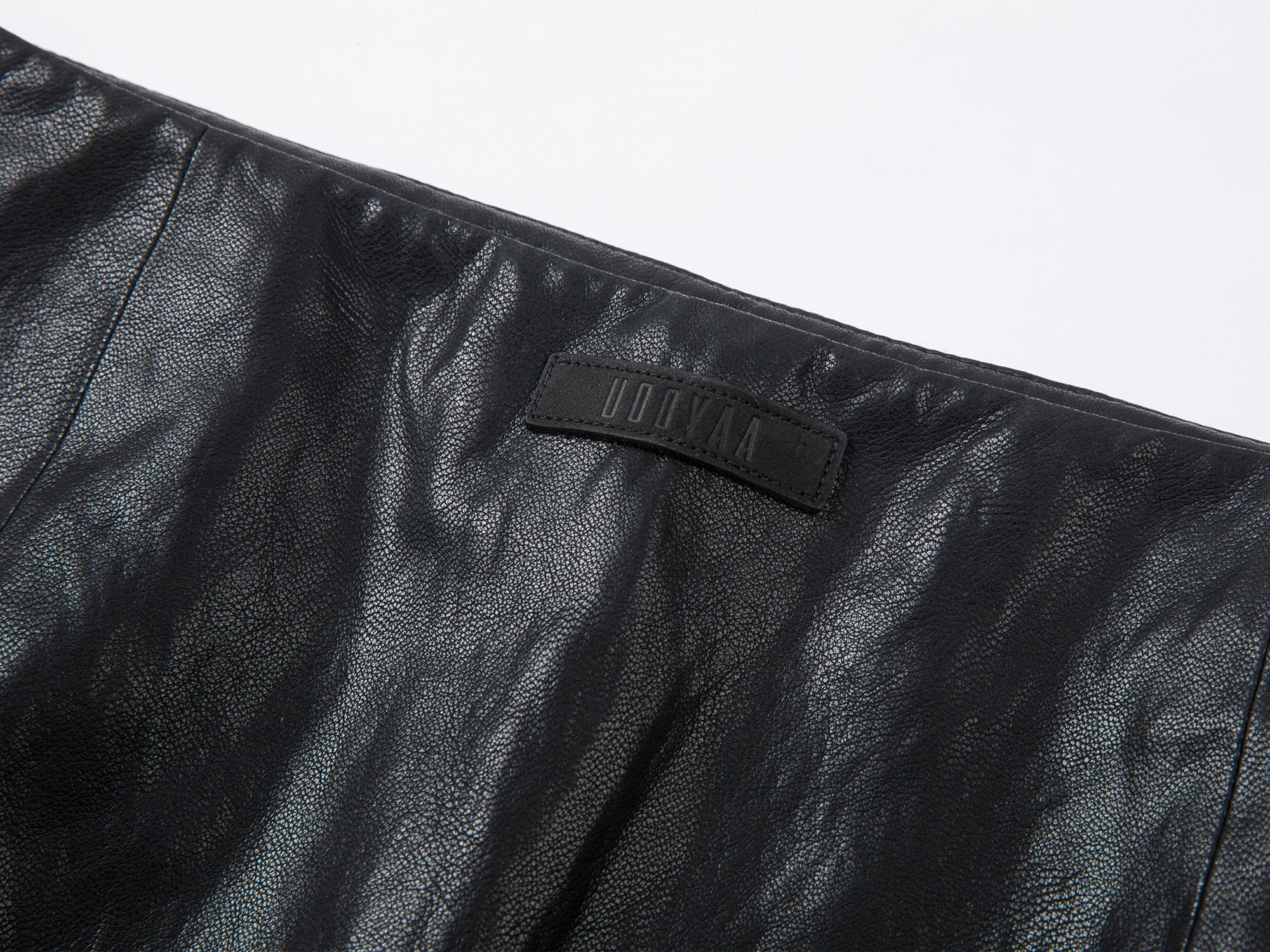 Lace-paneled PU leather skirt