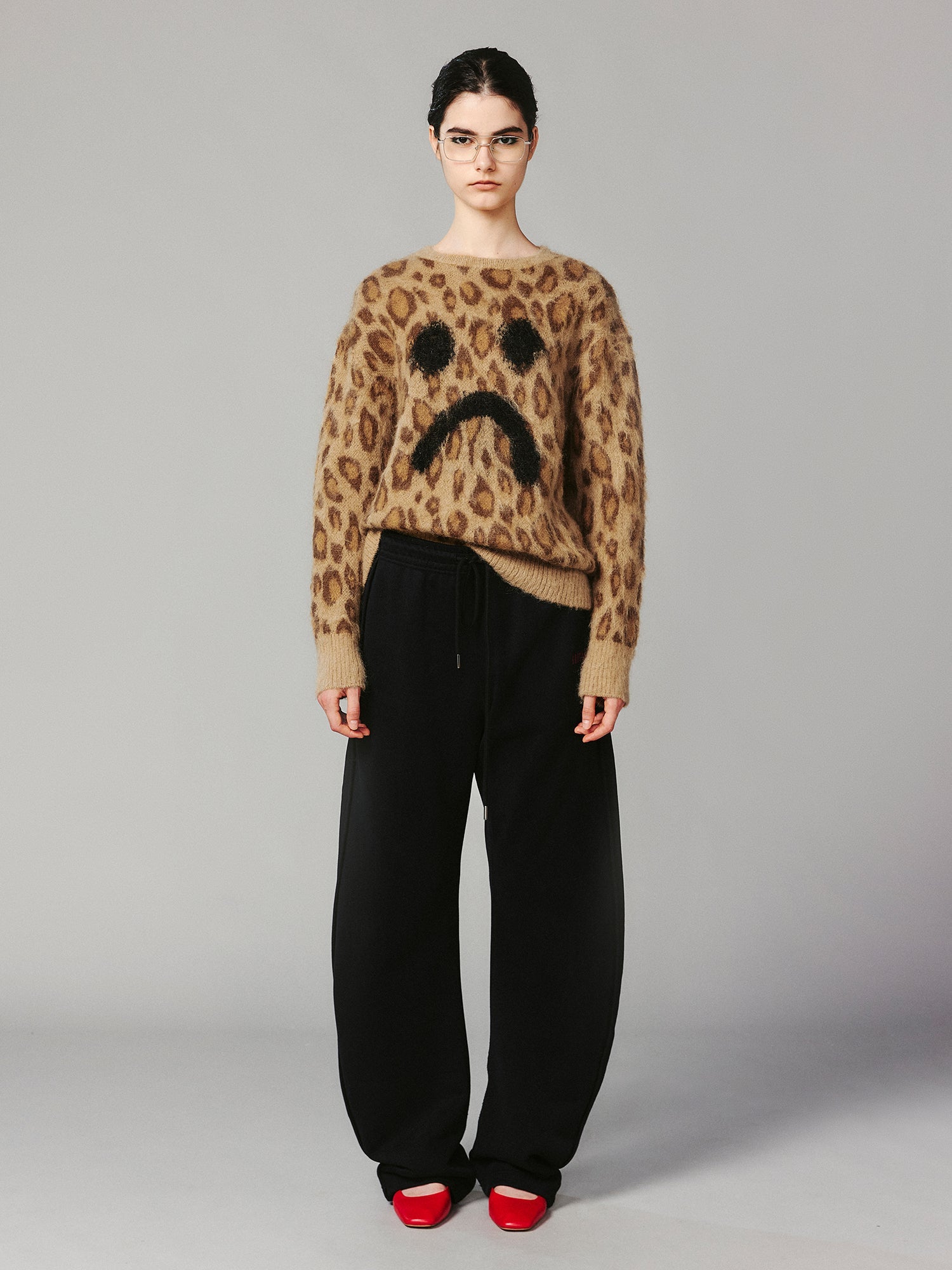 Leopard print crying face pullover sweater