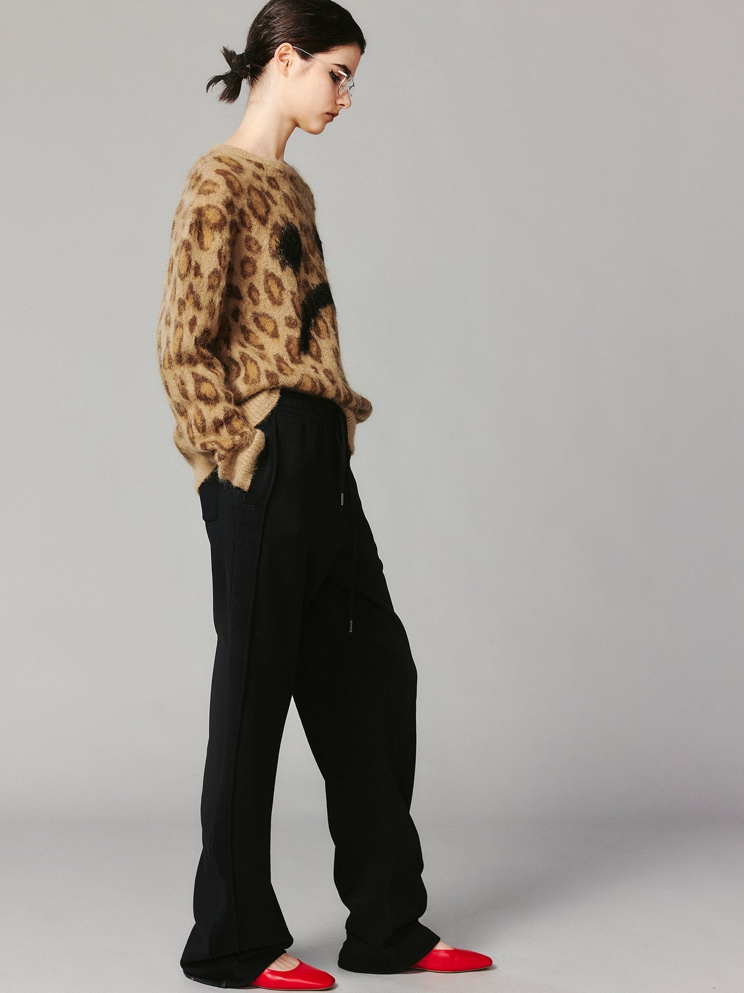 Leopard print crying face pullover sweater