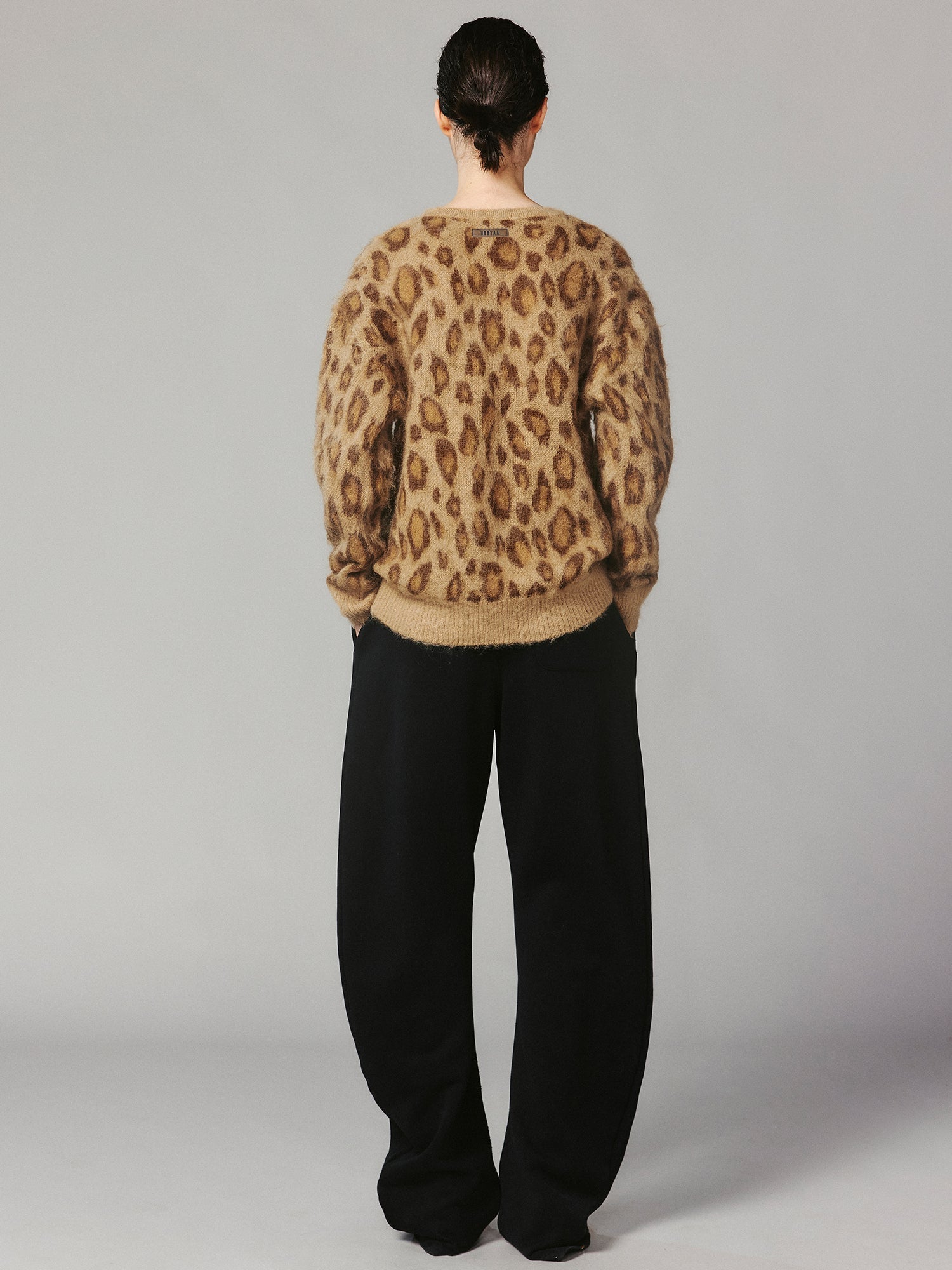 Leopard print crying face pullover sweater