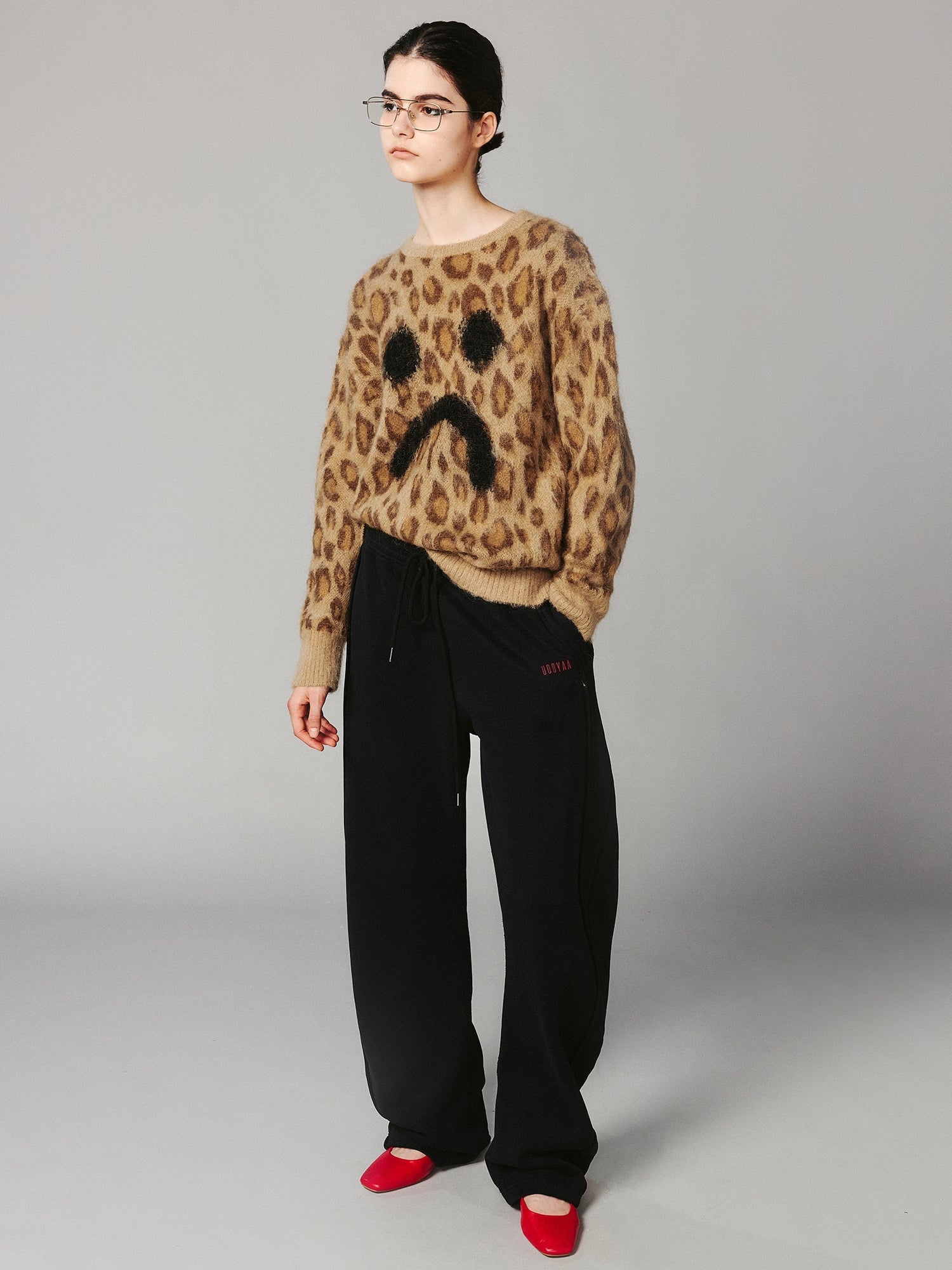 Leopard print crying face pullover sweater