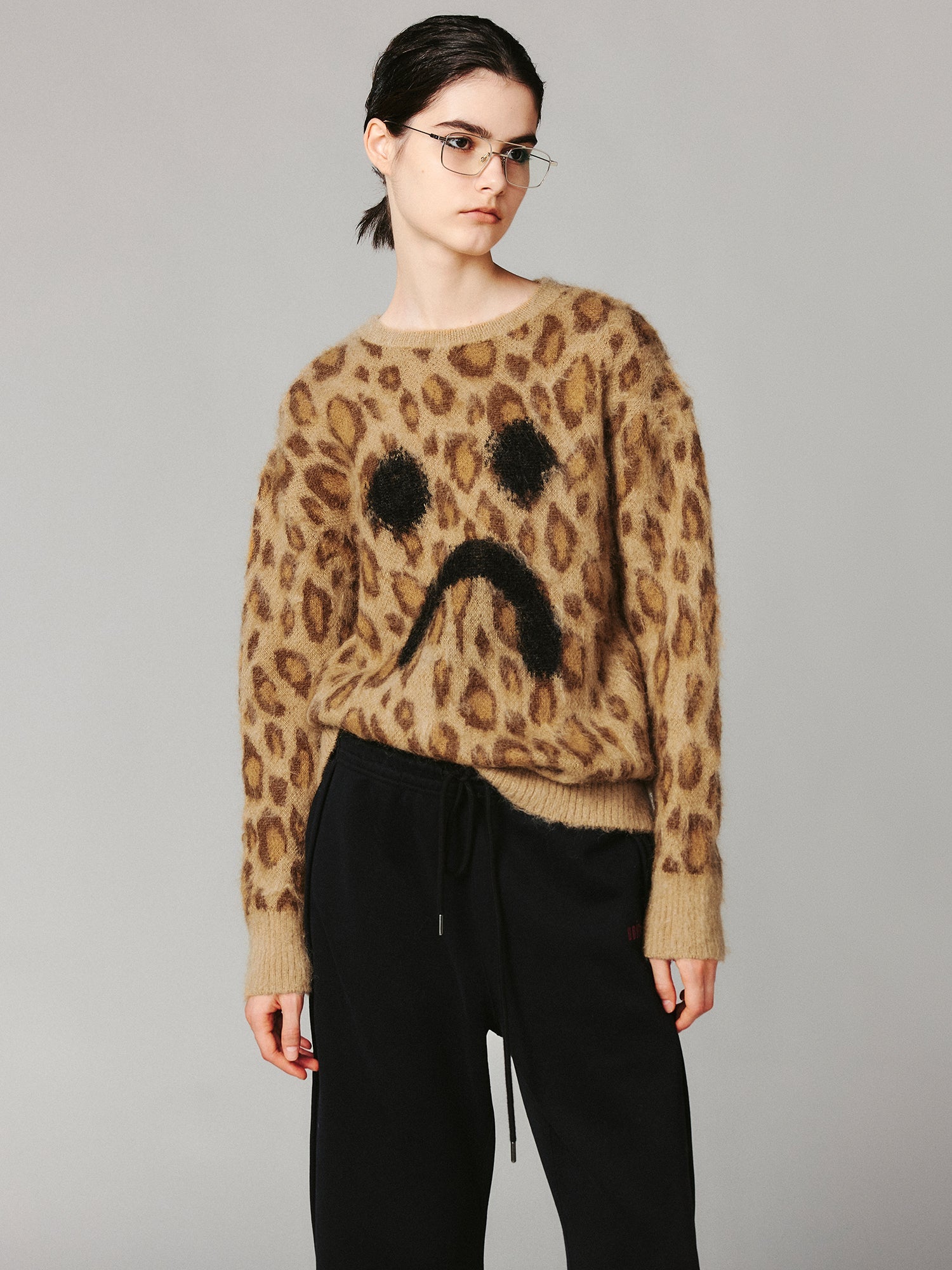 Leopard print crying face pullover sweater