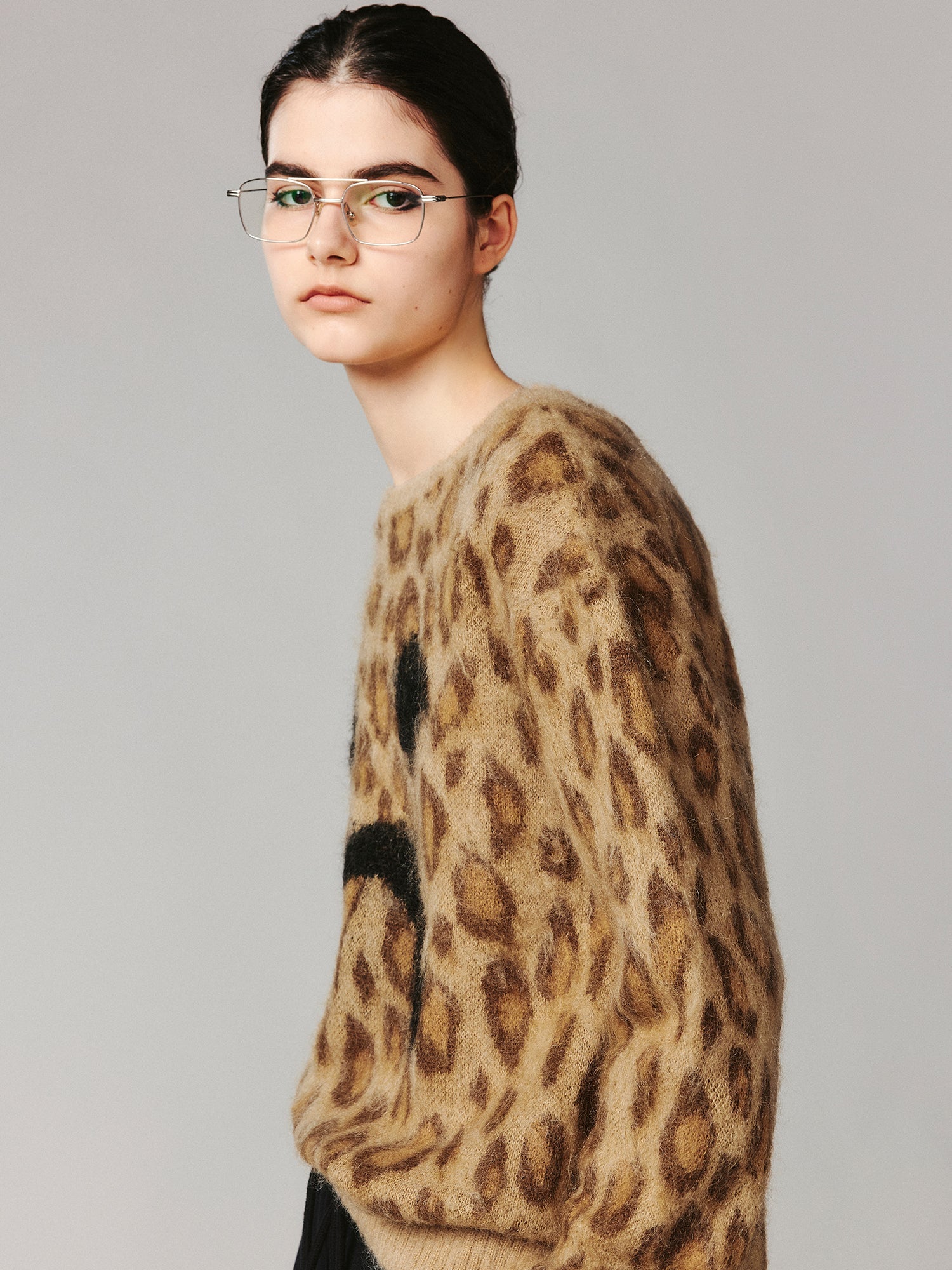 Leopard print crying face pullover sweater