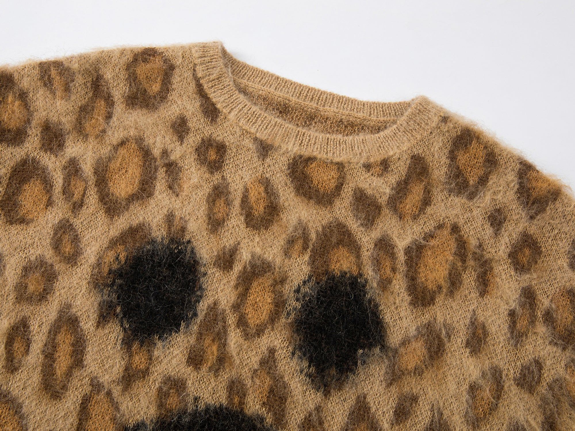 Leopard print crying face pullover sweater