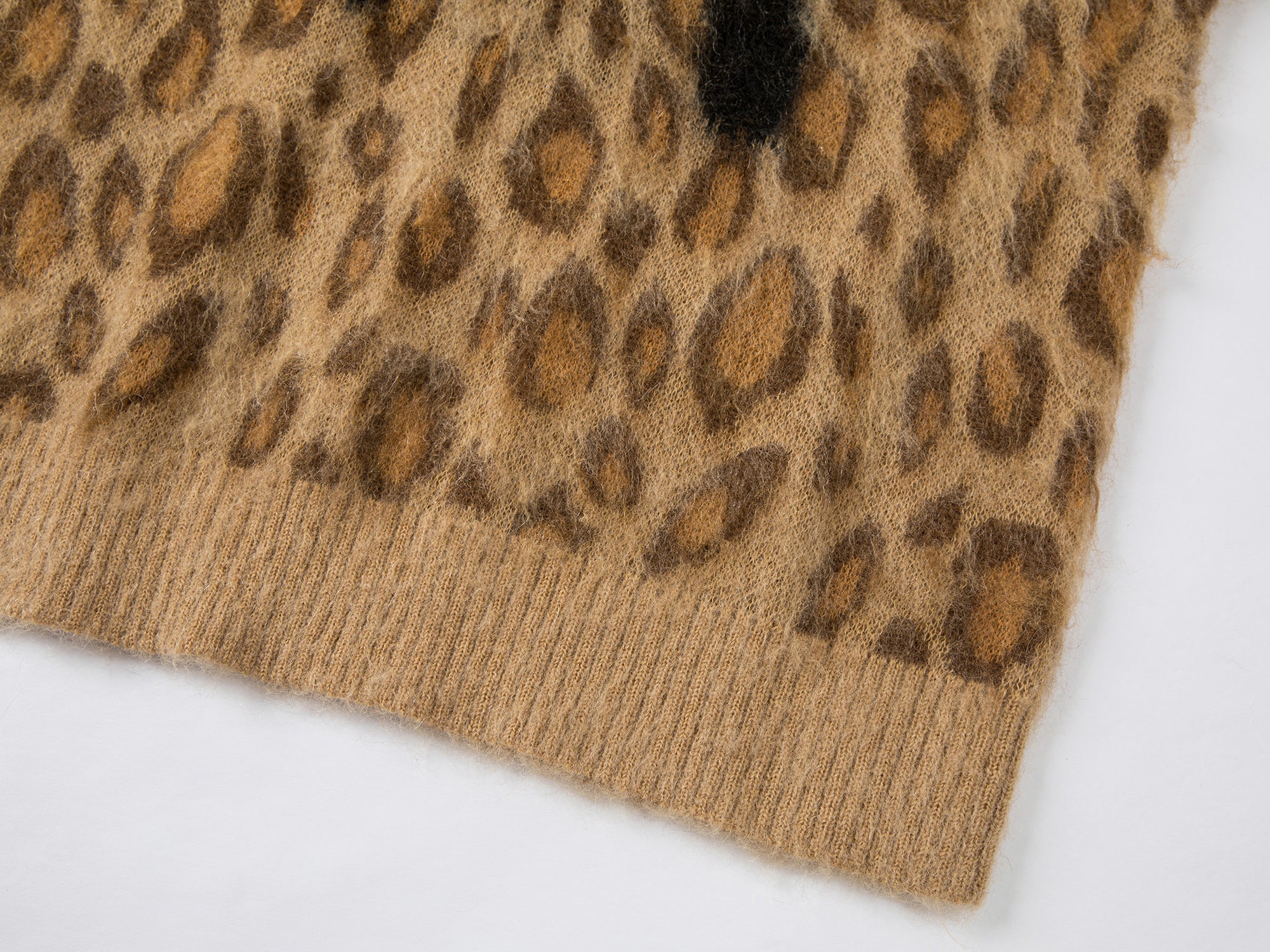 Leopard print crying face pullover sweater