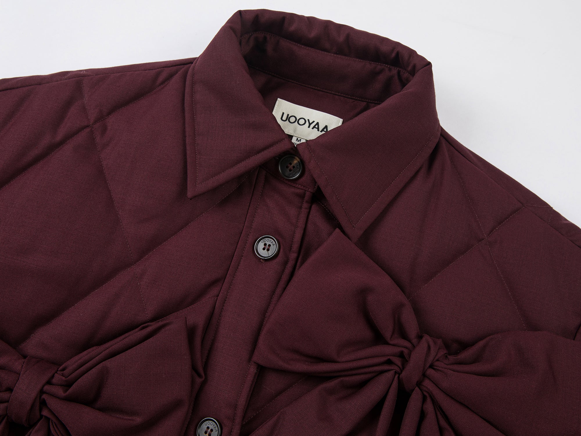 Bow shirt-style puffer jacket