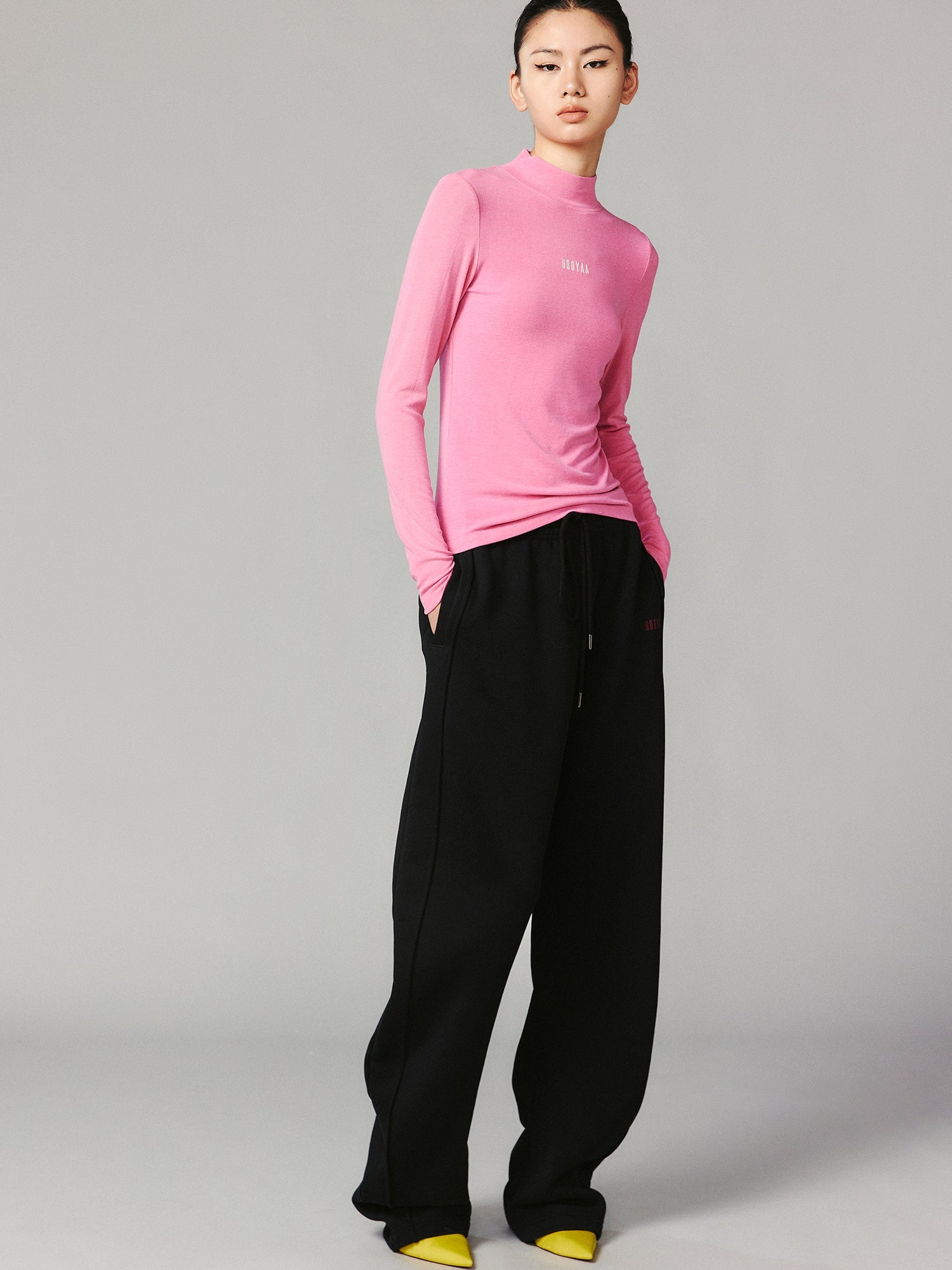 Architectural logo curved knife sweatpants