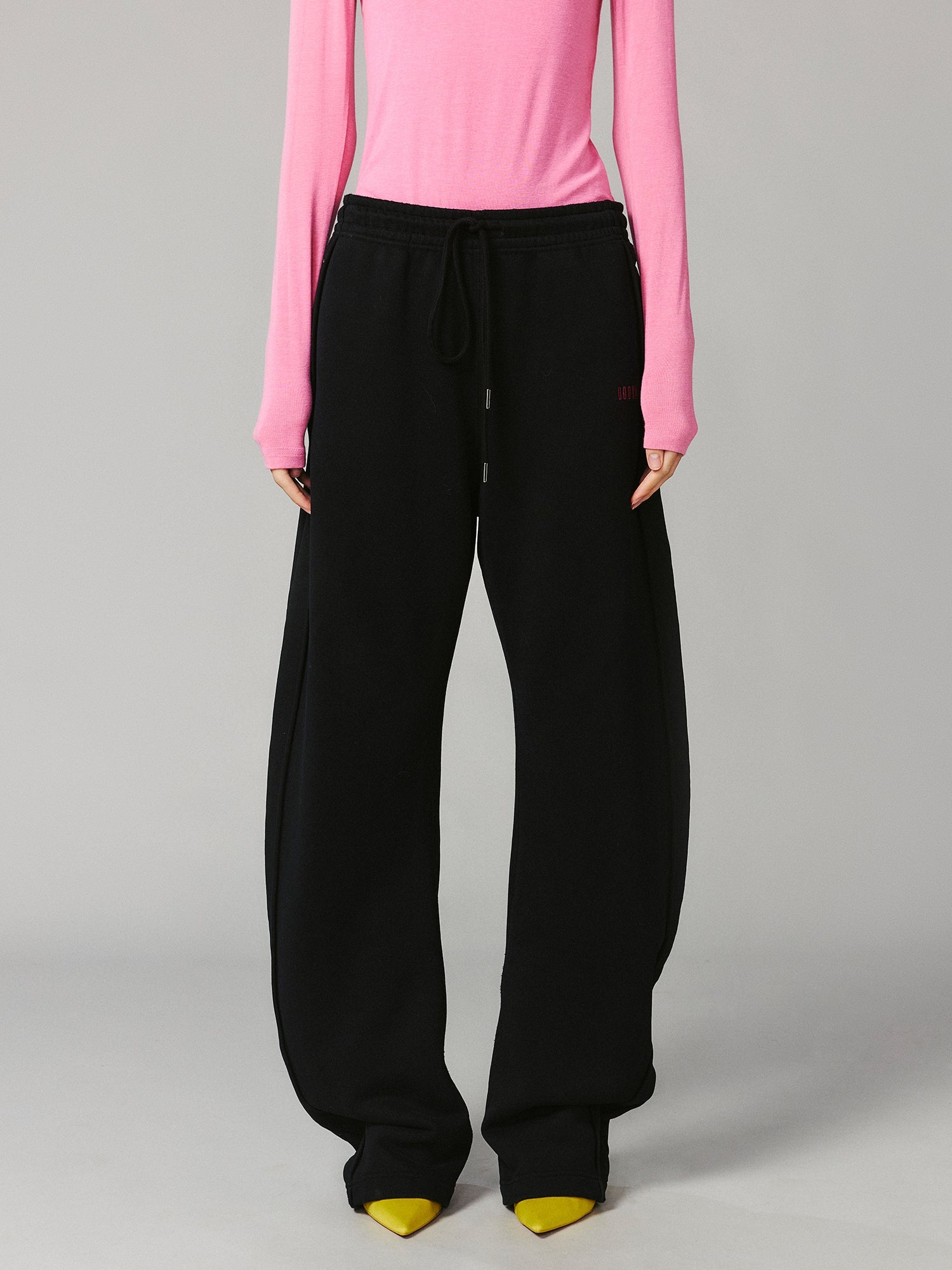 Architectural logo curved knife sweatpants