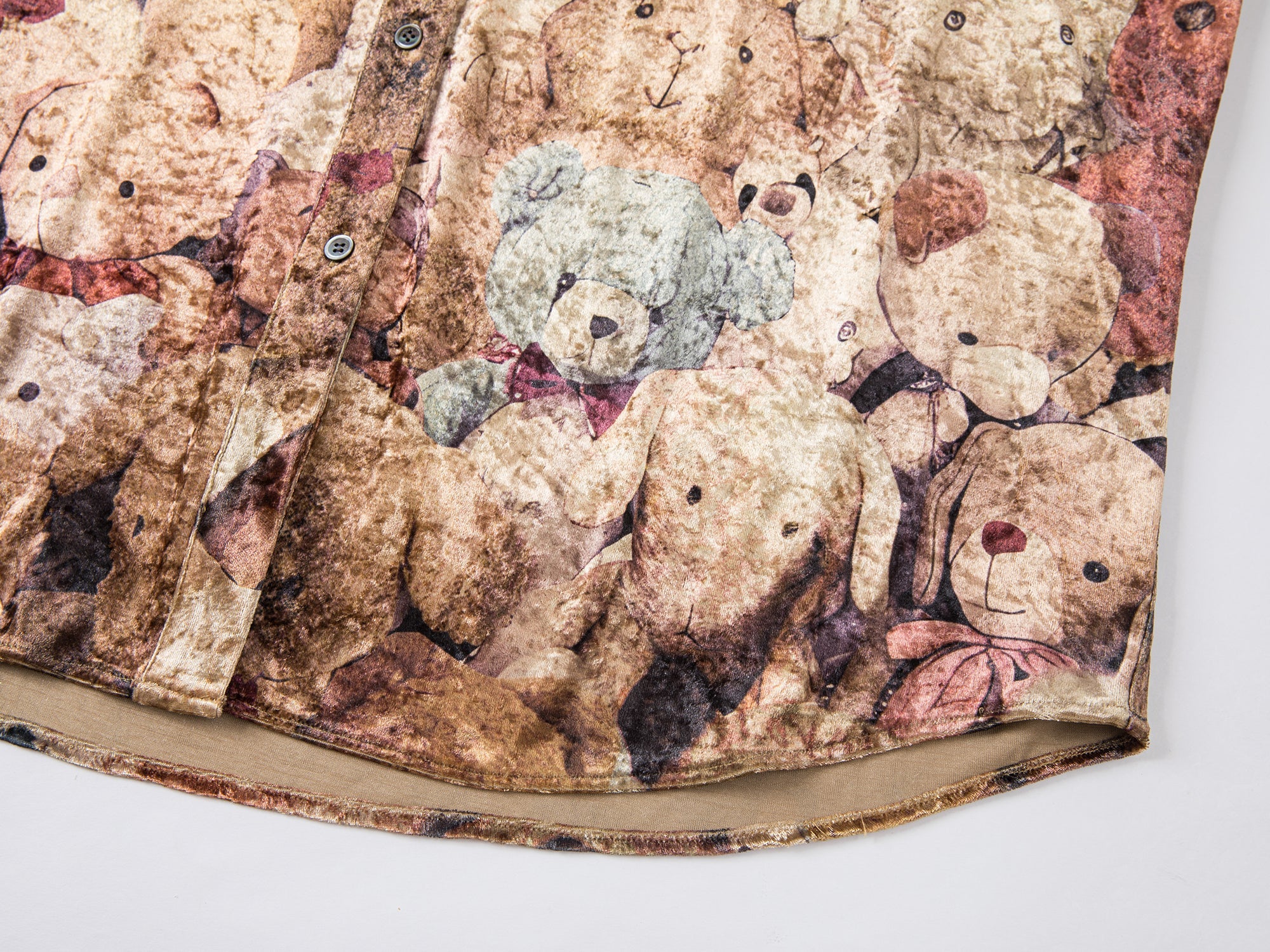 Velvet printed shirt brimming with vintage plush toys