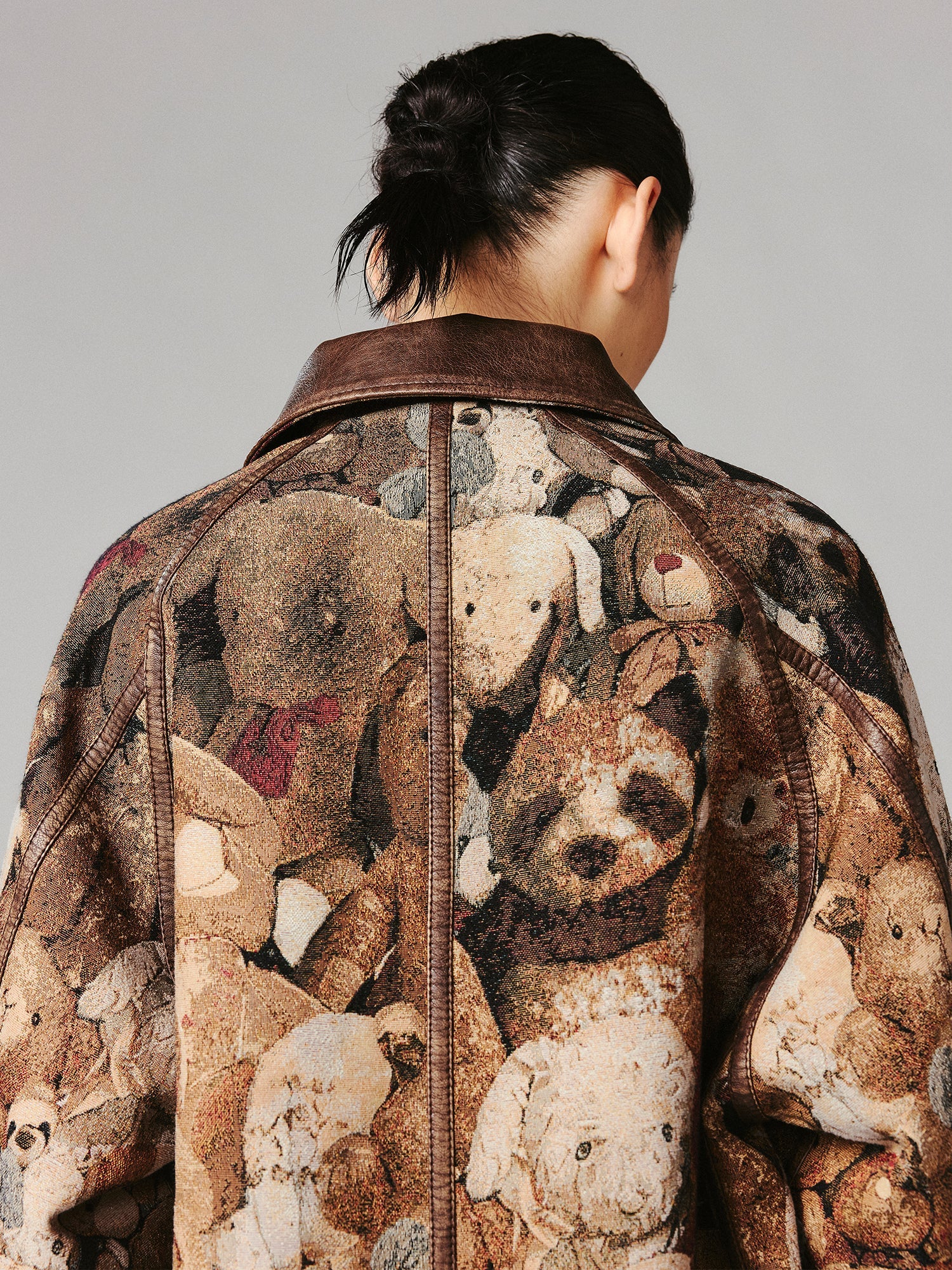 M35 blanket jacket covered with vintage plush toys