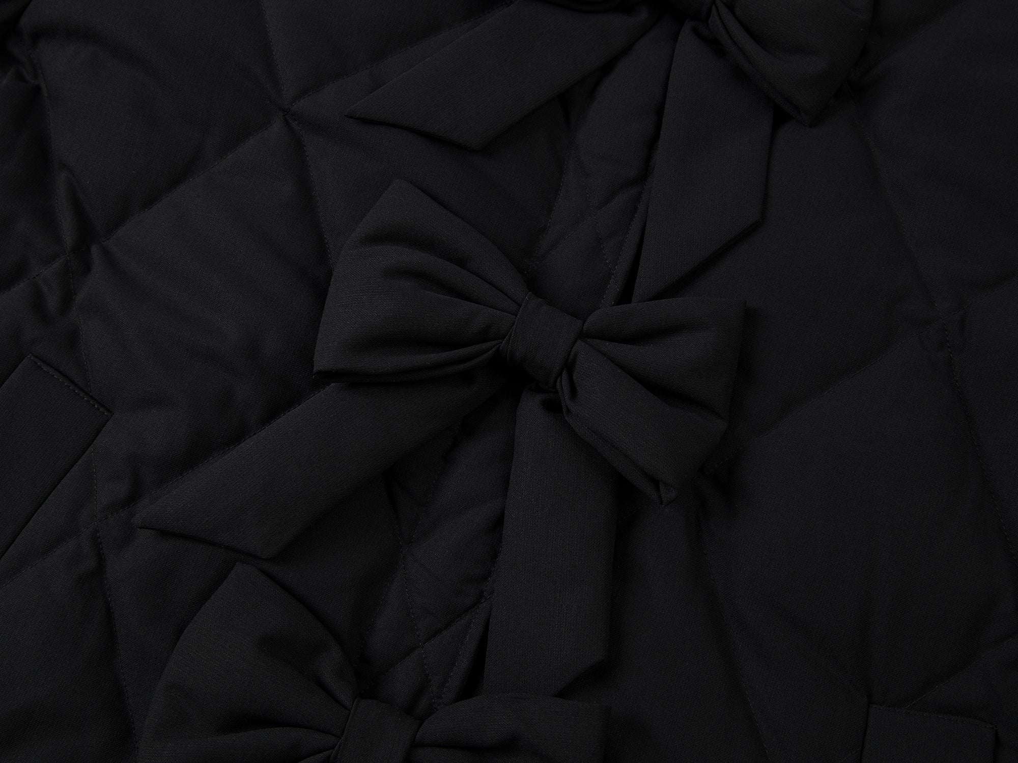 3D bow tie shirt-style puffer