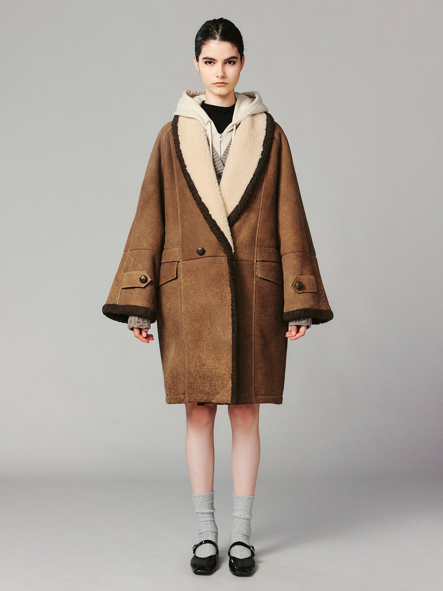 Shawl collar style merino wool and shearling coat