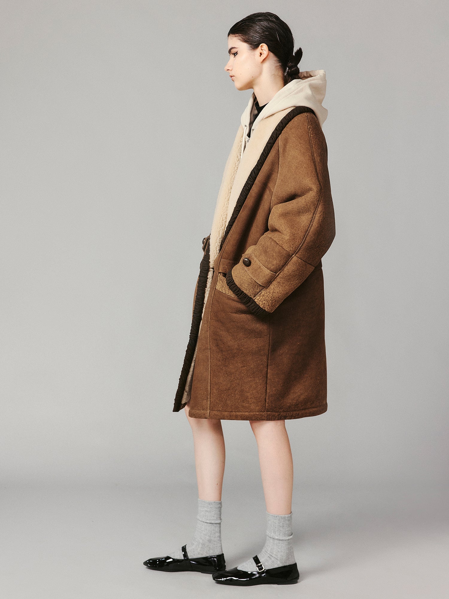 Shawl collar style merino wool and shearling coat