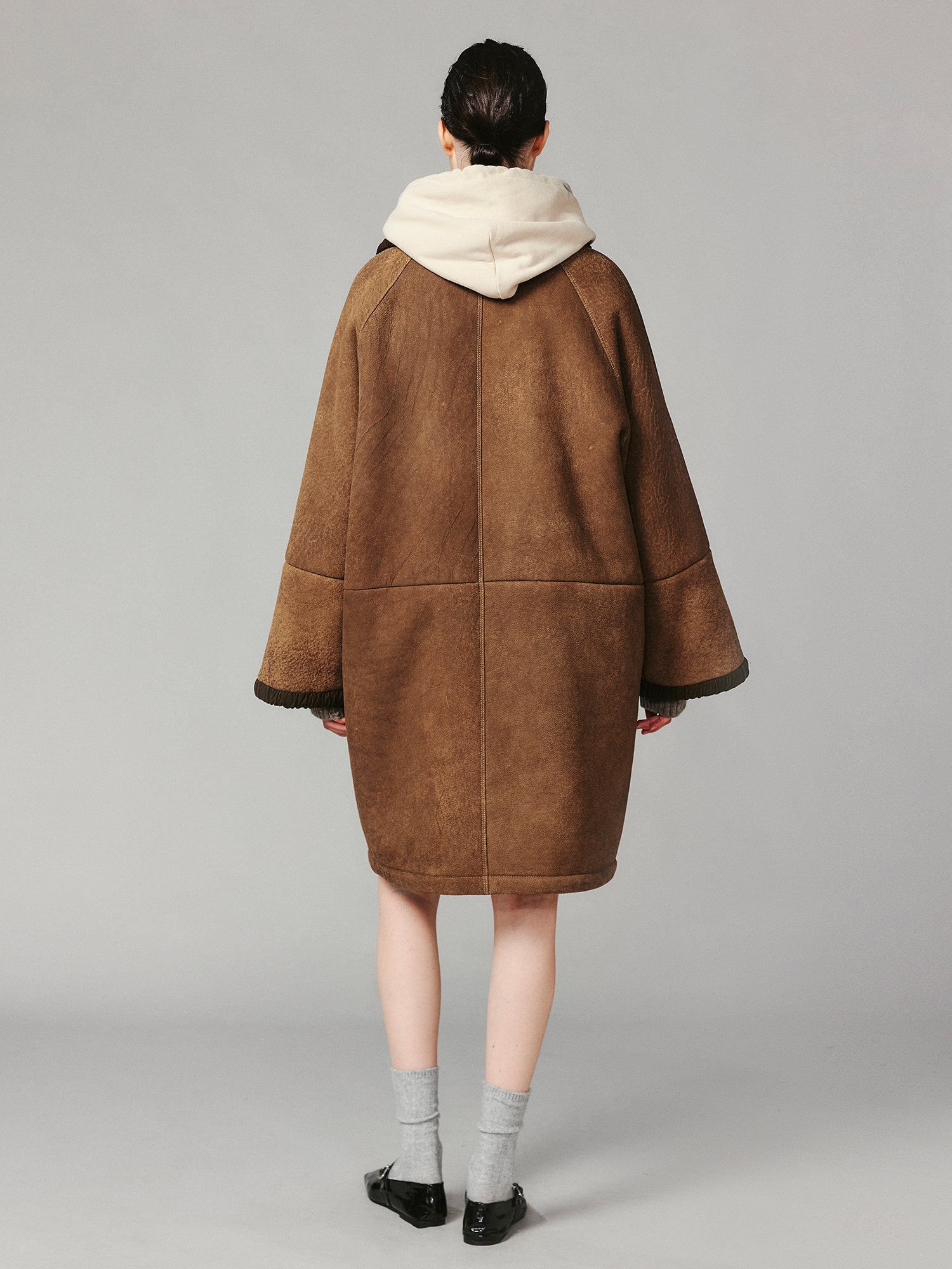 Shawl collar style merino wool and shearling coat
