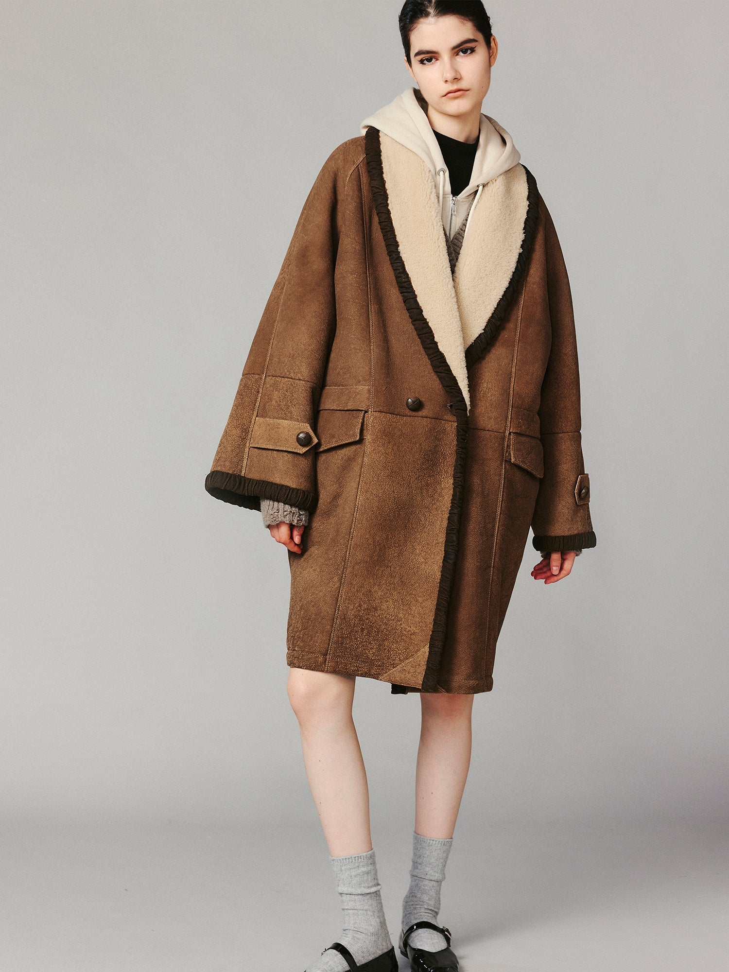 Shawl collar style merino wool and shearling coat