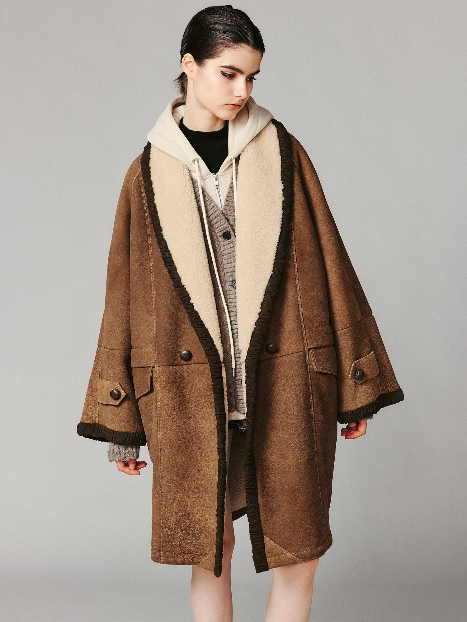Shawl collar style merino wool and shearling coat