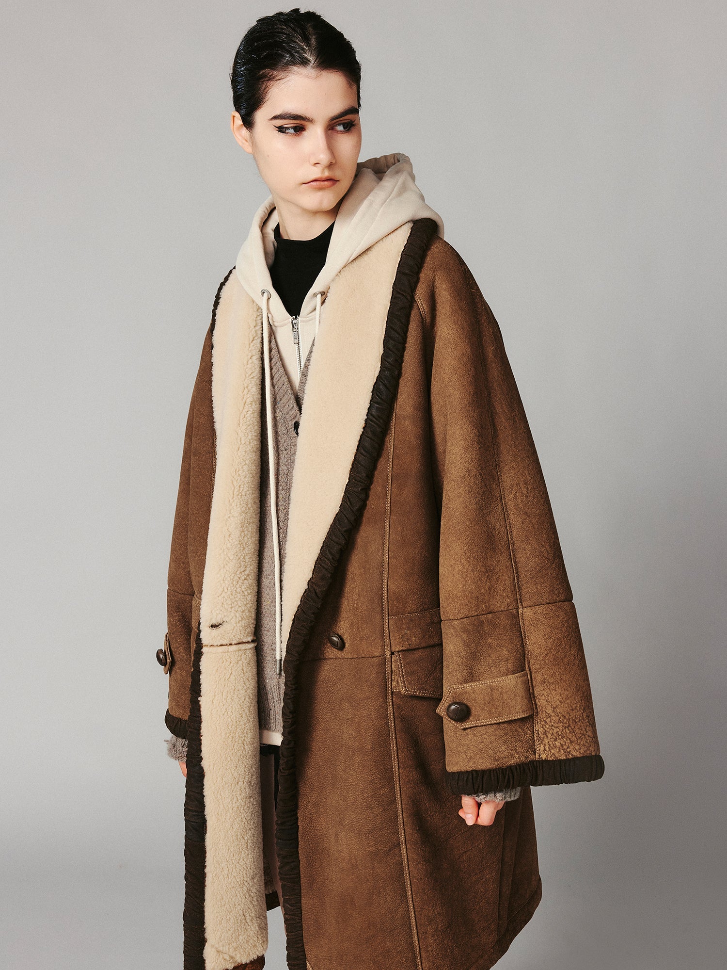Shawl collar style merino wool and shearling coat