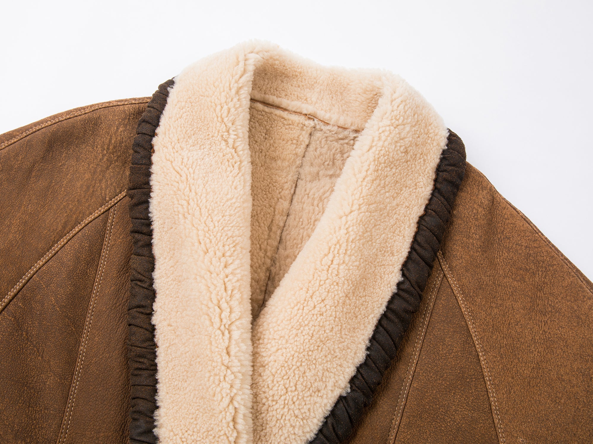 Shawl collar style merino wool and shearling coat