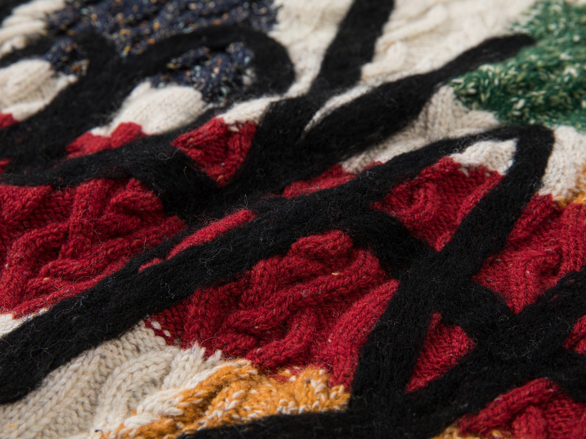 Graffiti cable-knit pullover