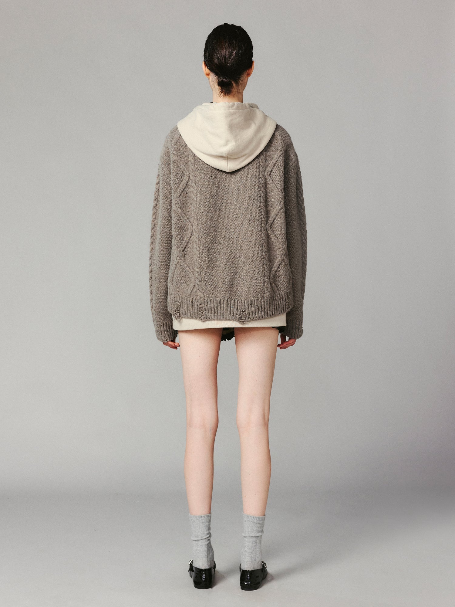 Layered look cable-knit hoodie with 3D bear peeking through