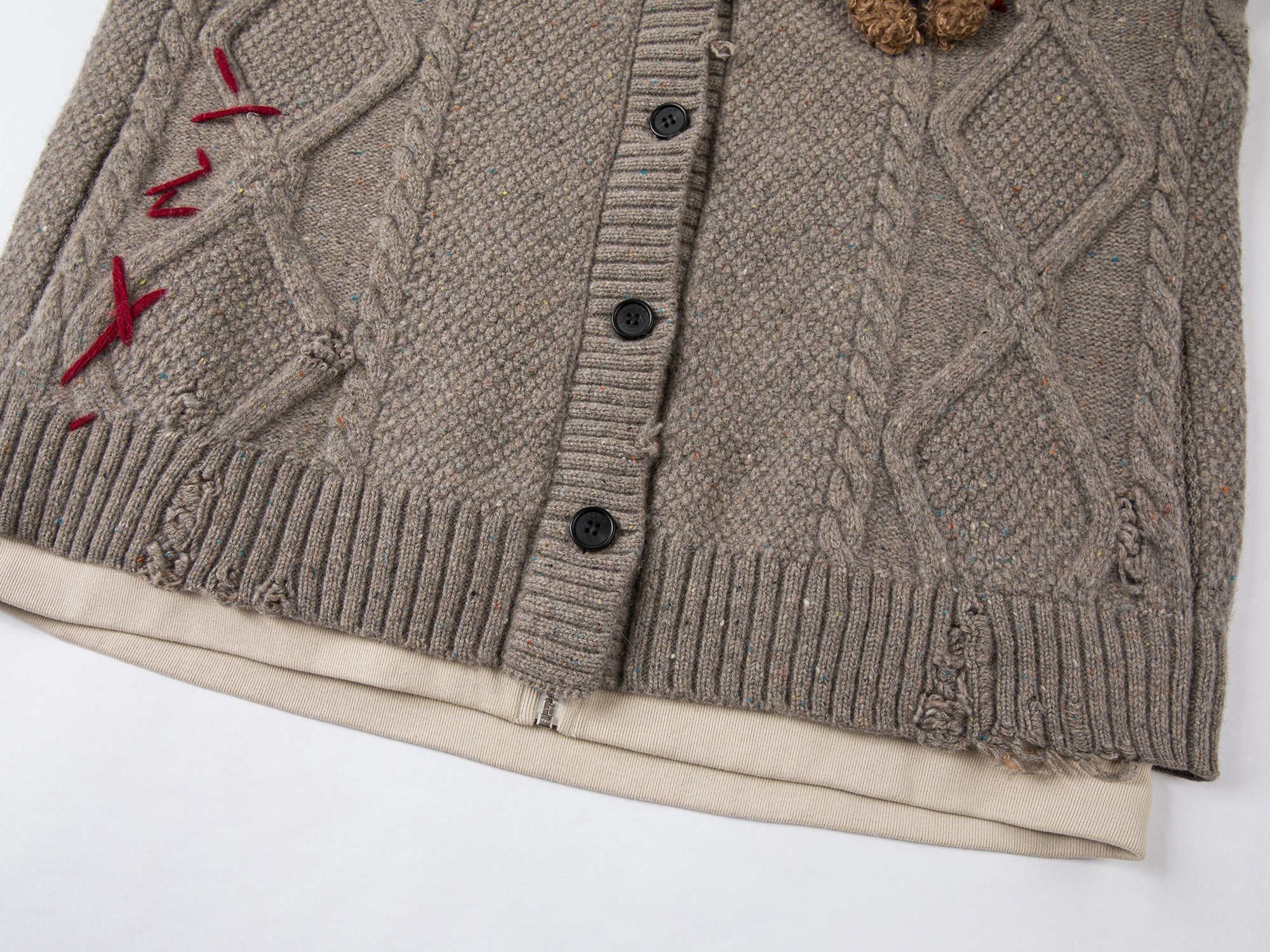 Layered look cable-knit hoodie with 3D bear peeking through