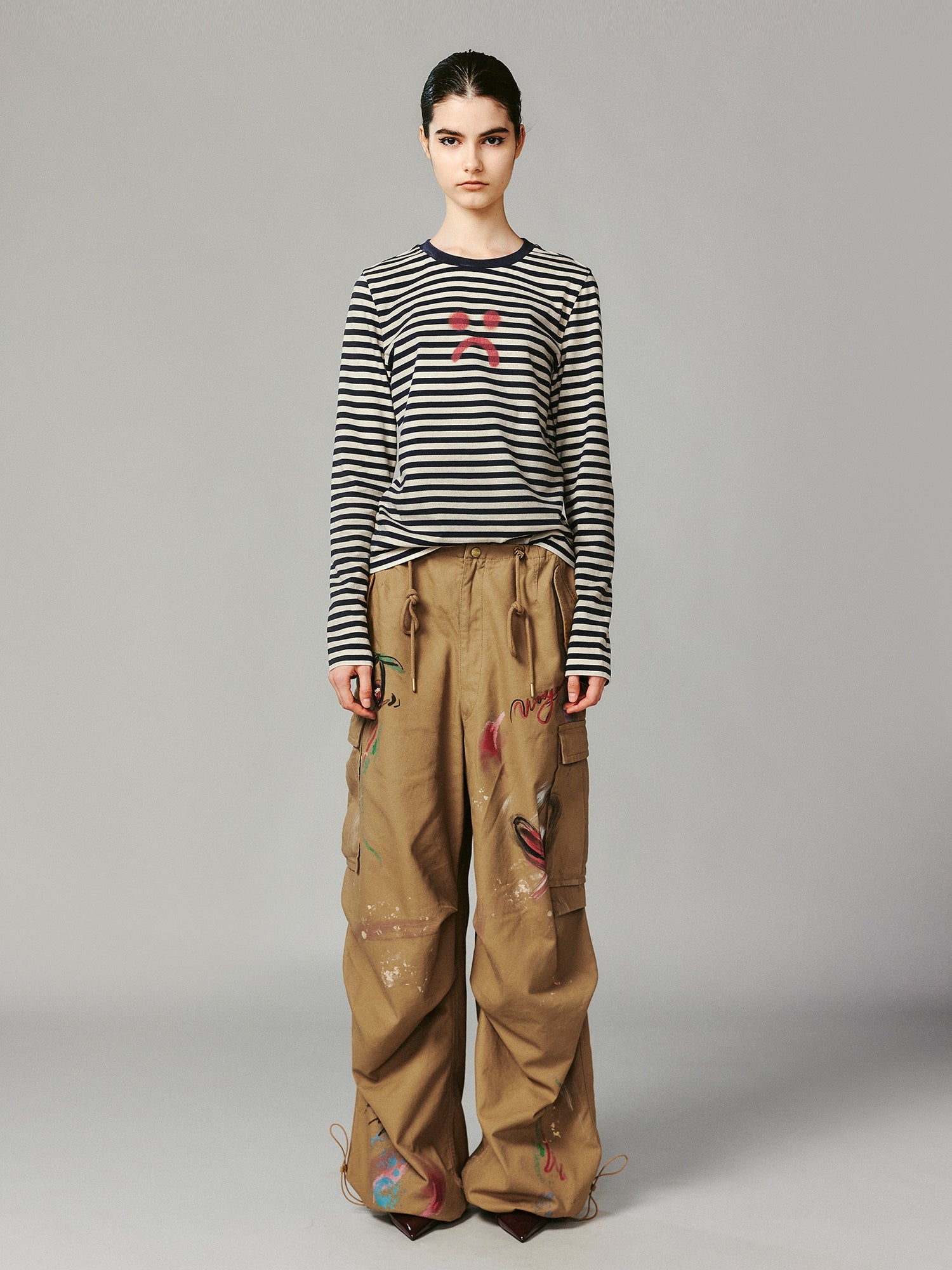 Striped sad face t-shirt