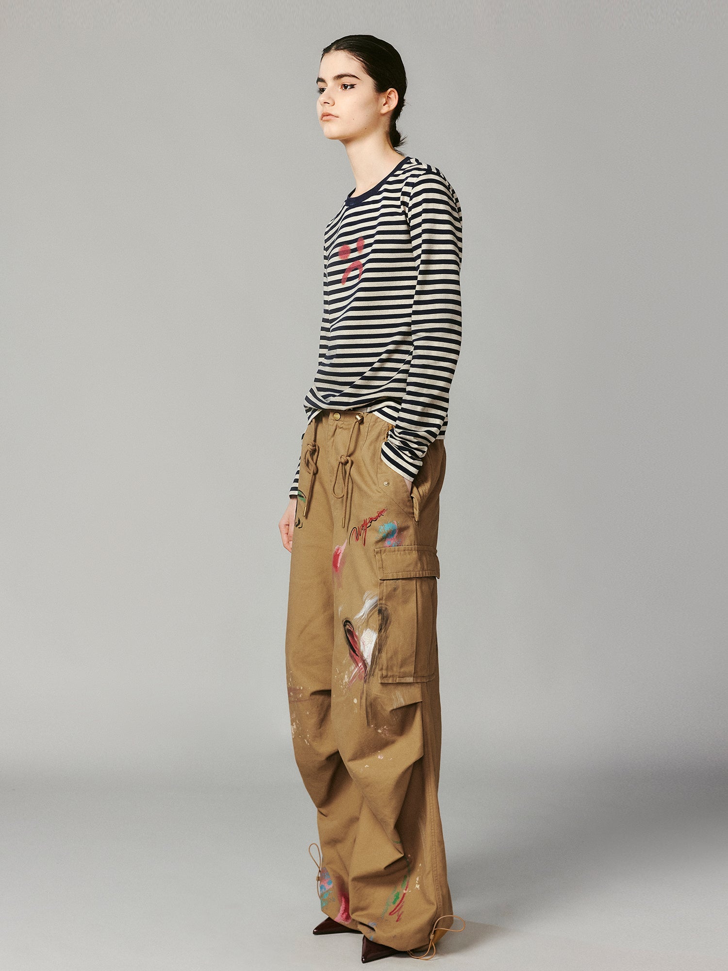 Striped sad face t-shirt