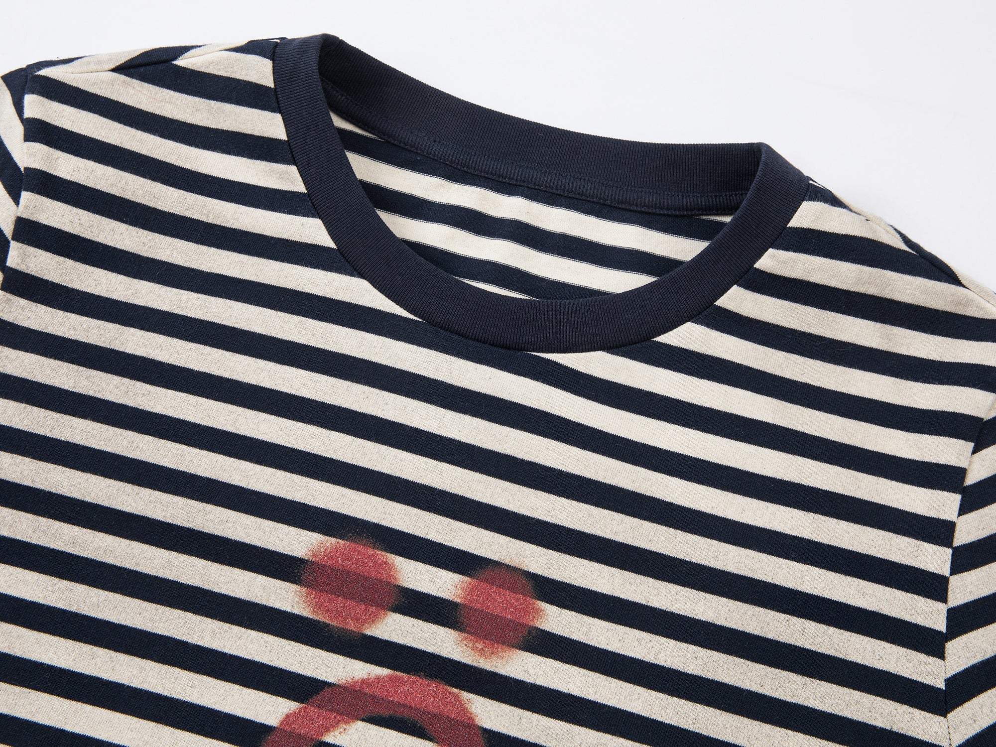 Striped sad face t-shirt