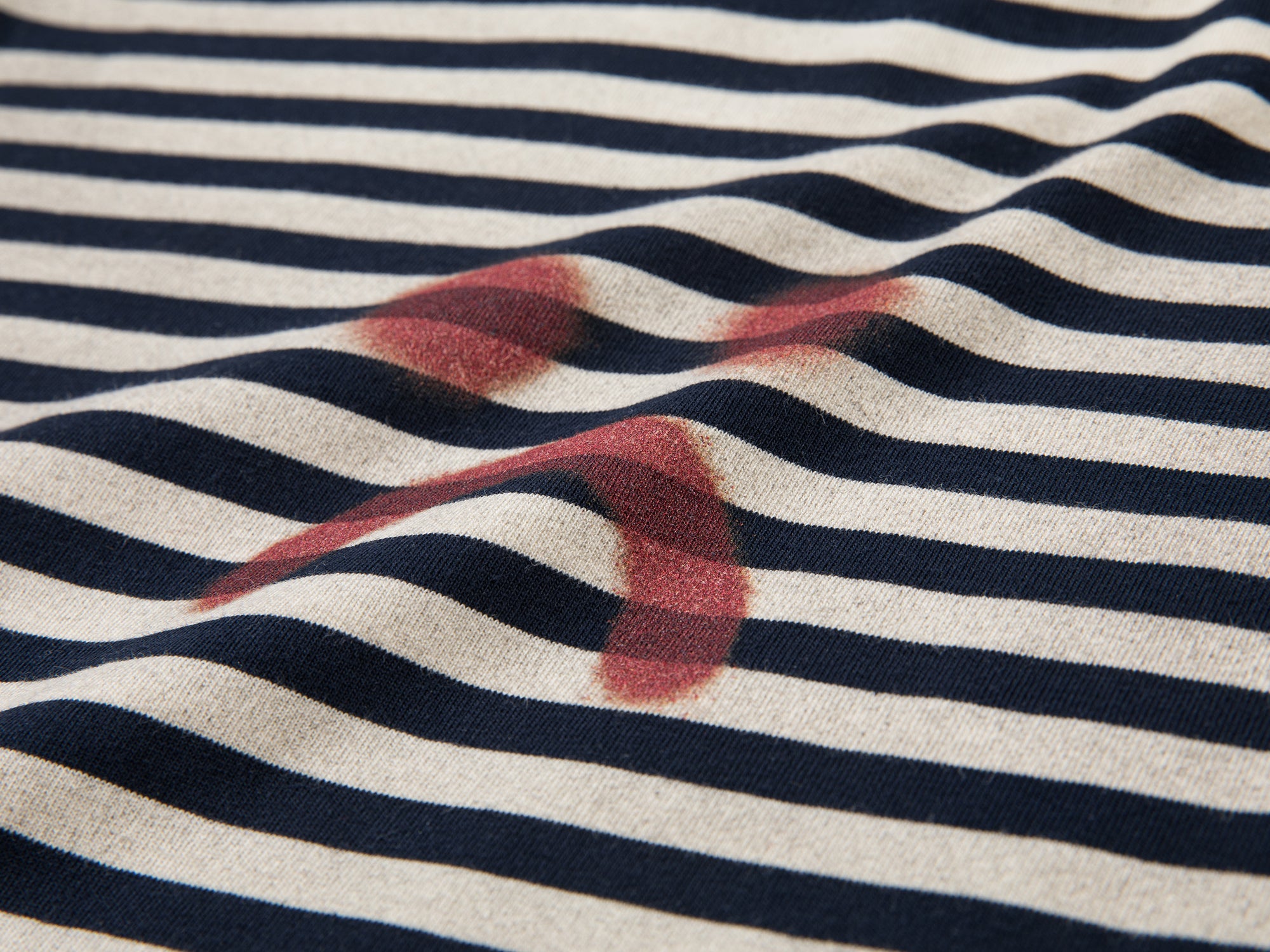 Striped sad face t-shirt