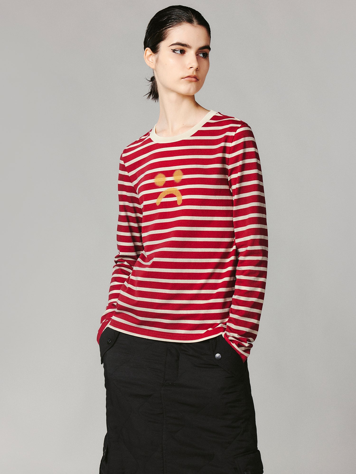 Striped sad face t-shirt