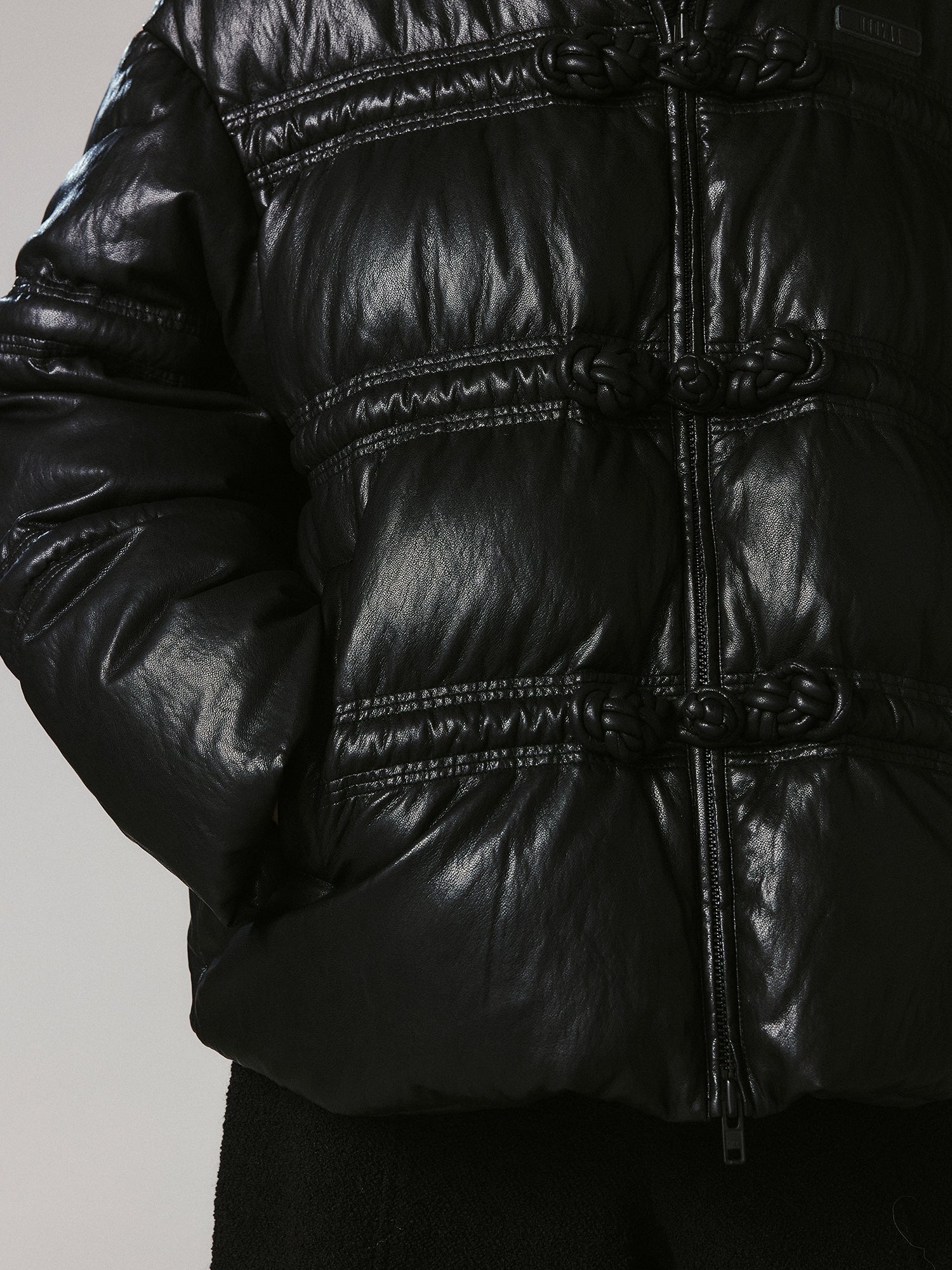 3D laced toggle PU puffer jacket
