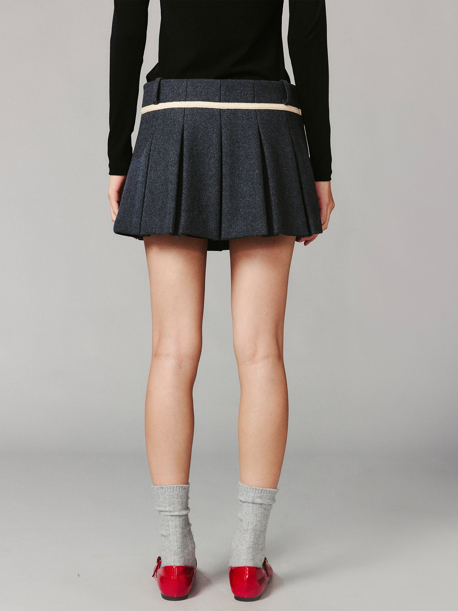 School-style pleated wool skirt