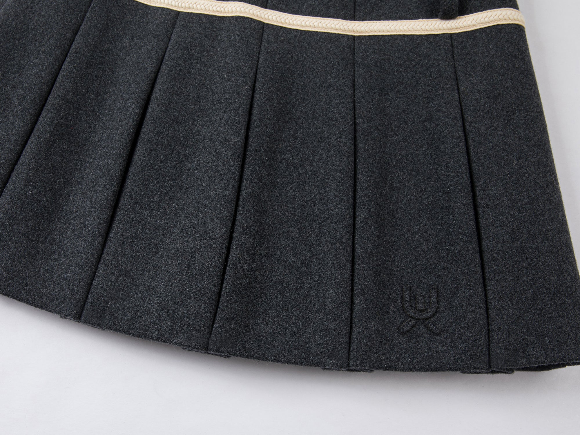 School-style pleated wool skirt