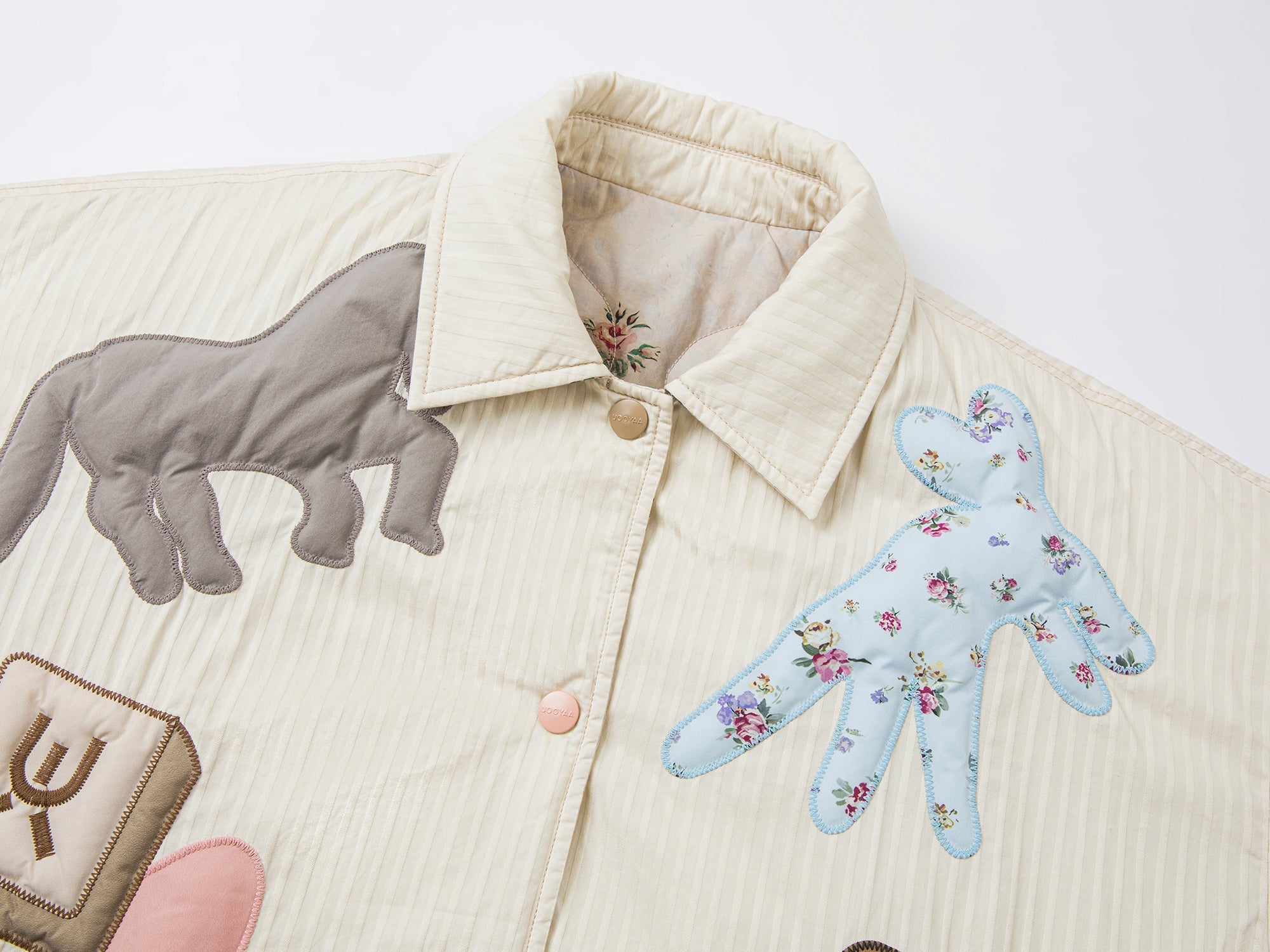 Reversible puffer jacket embroidered with childhood dolls and vintage wallpaper print