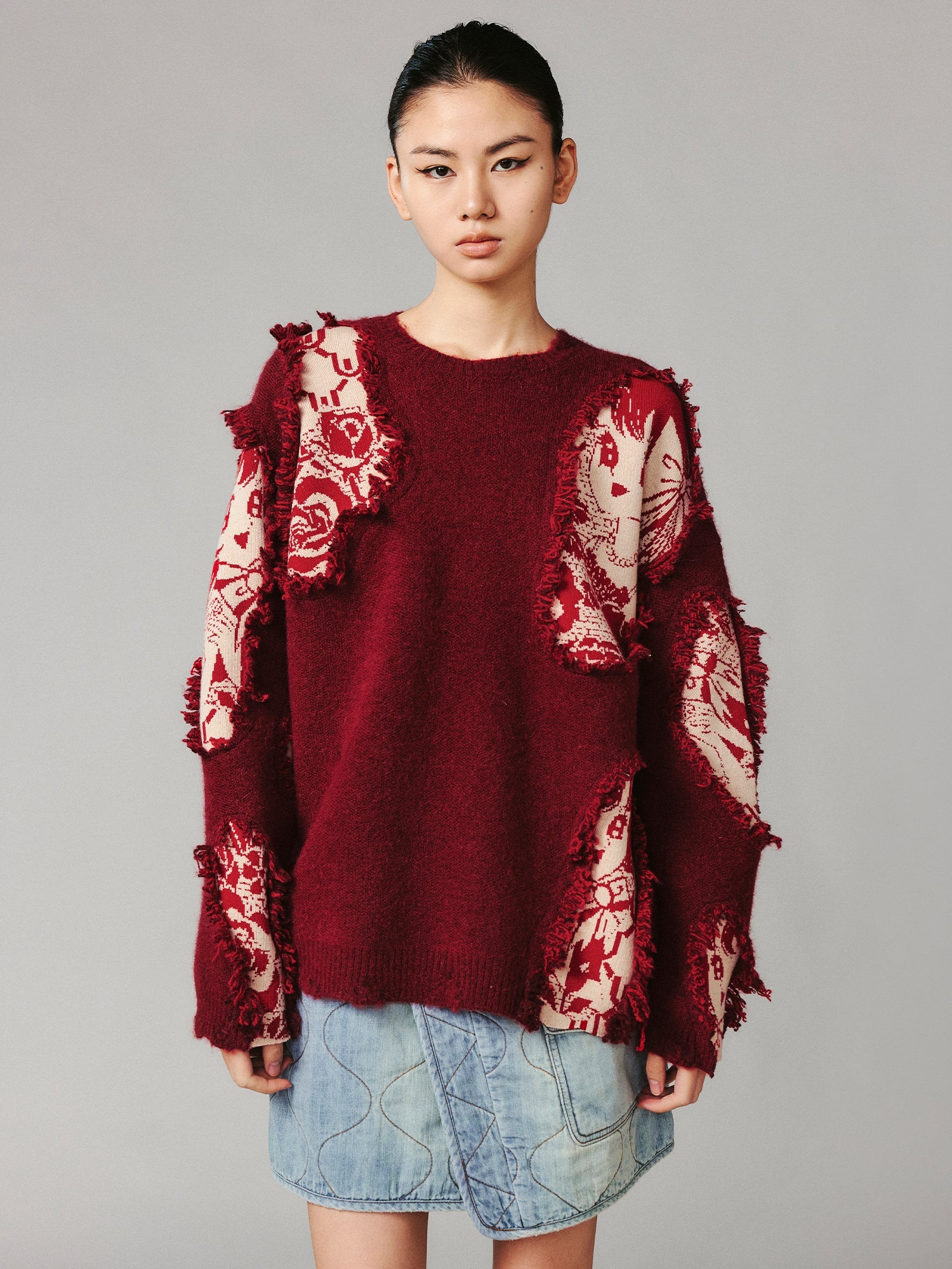 Playful New Year print anime girl pullover sweater with distressed and patched details