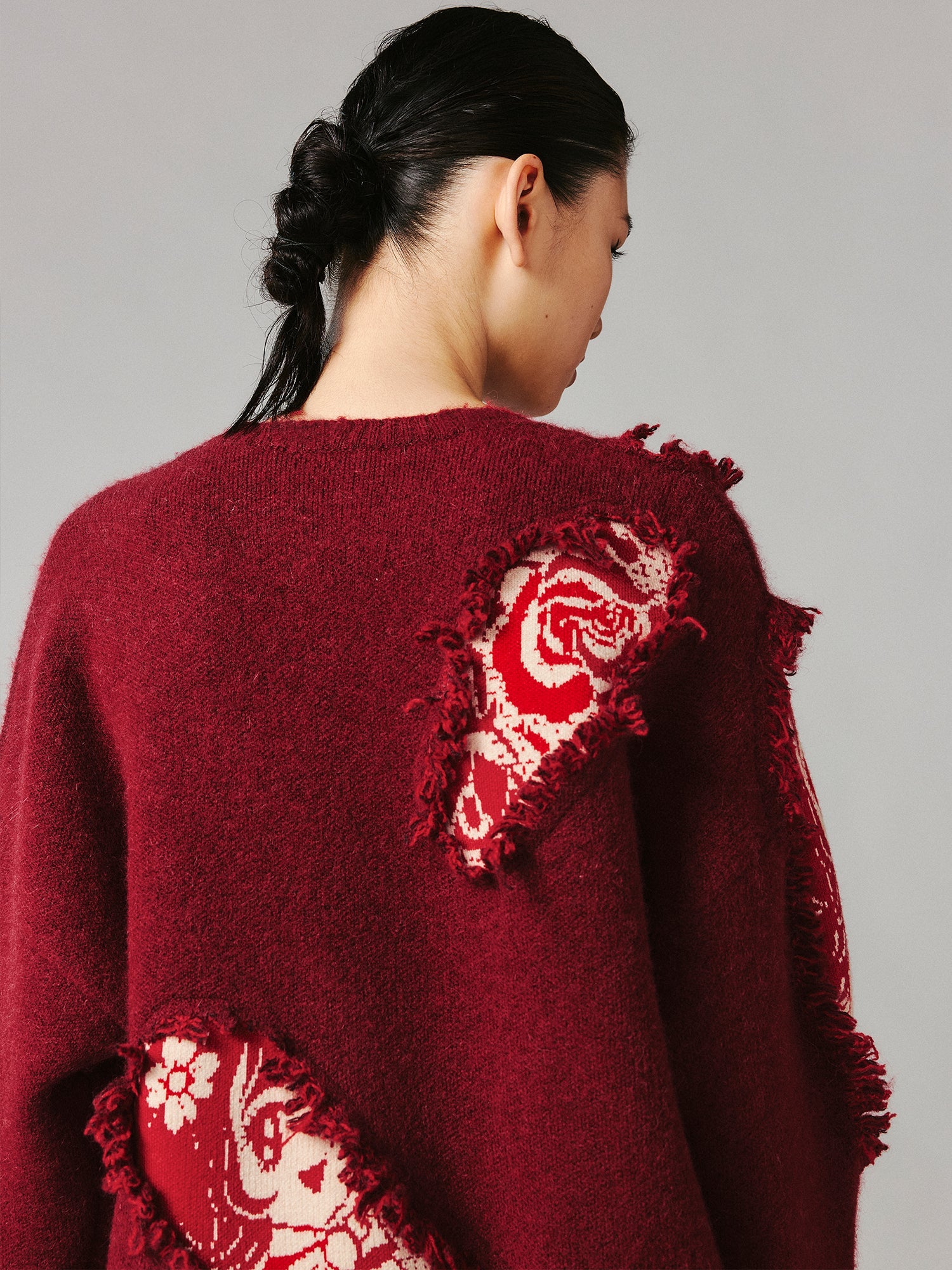 Playful New Year print anime girl pullover sweater with distressed and patched details